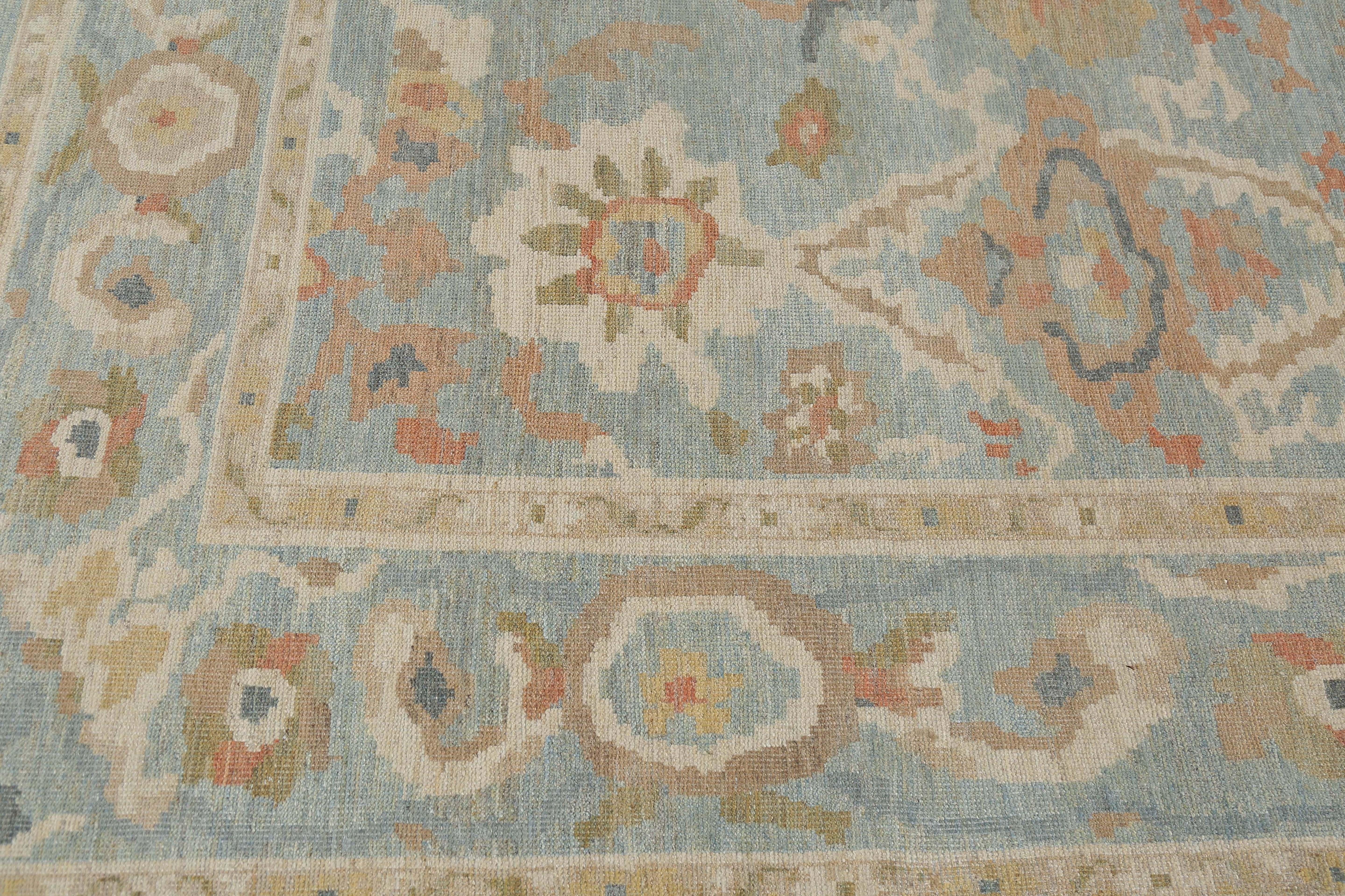 Introducing the exquisite New Muted Pastel Turkish Sultanabad rug, a true masterpiece of craftsmanship. This handmade rug features a stunning combination of pastel blues and yellows, creating a serene and calming atmosphere in any room. Measuring