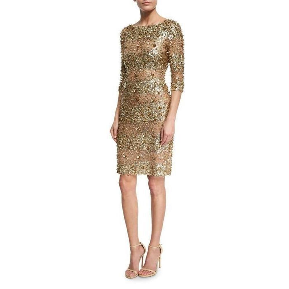 Naeem Khan cocktail dress with allover mixed beading.
Bateau neckline.
Three-quarter sleeves.
Fitted silhouette.
Hidden back zip.
Nylon; lining, silk.
Made in USA of imported material.
Size US 4