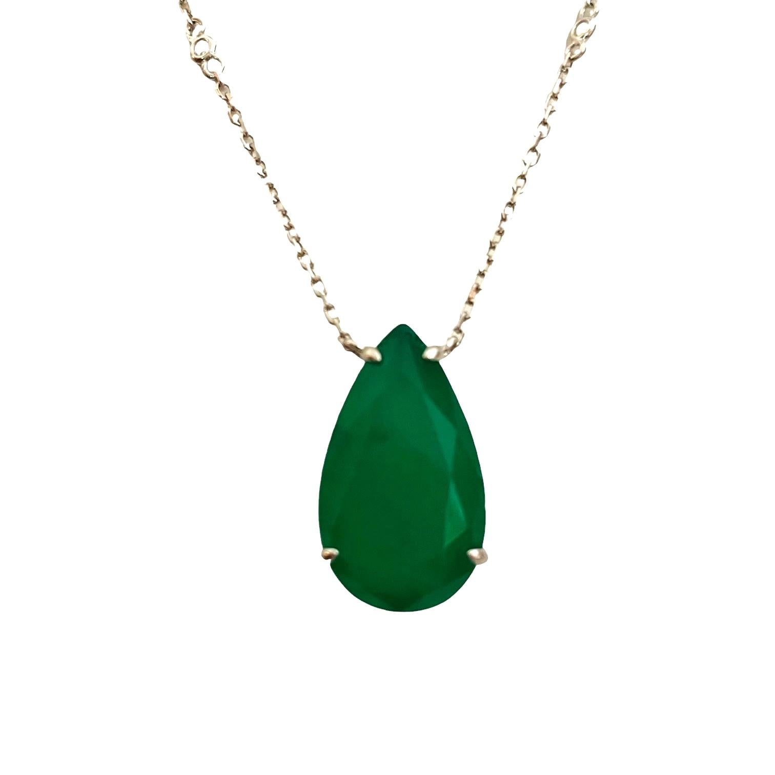 The Pear-Shaped stone is just a beautiful shade of green.  The chain is 16