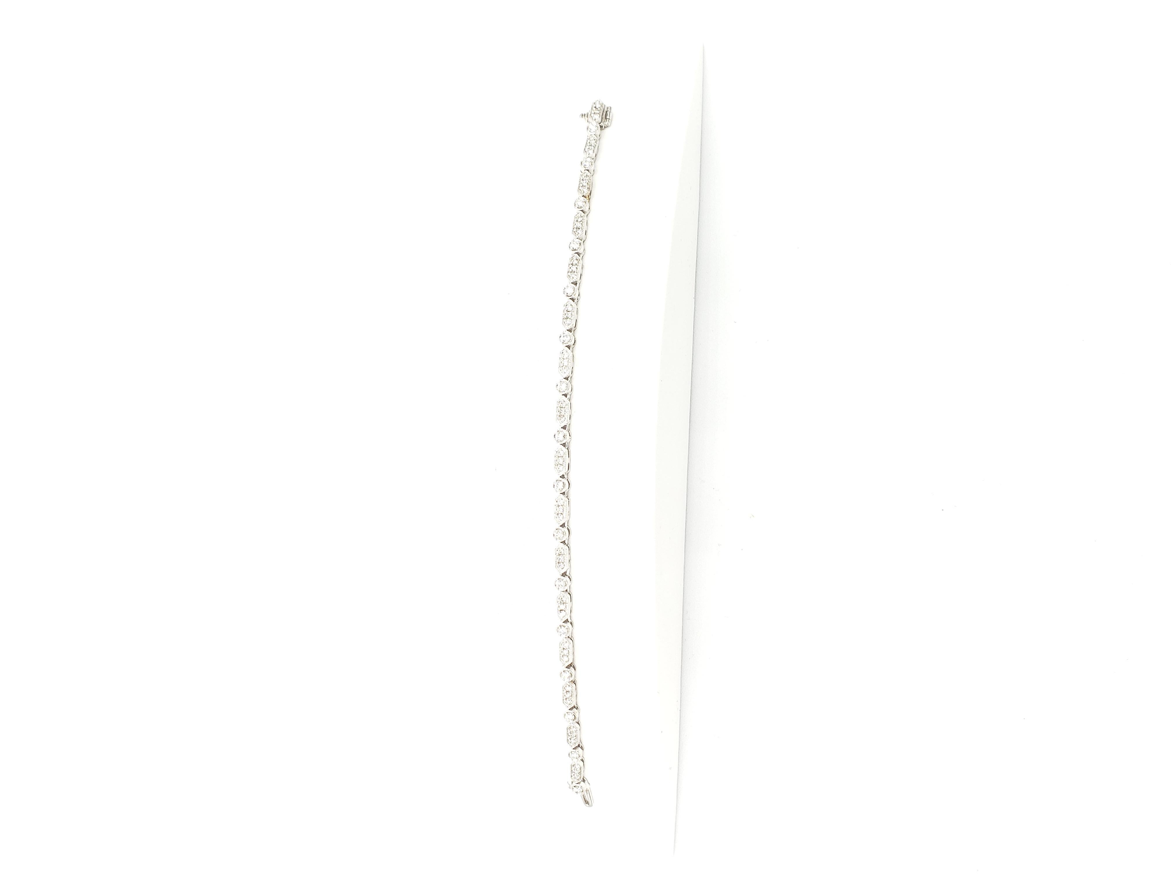 This stunning bracelet from LaFrancee is crafted with 14k white gold and features natural white diamonds with F/VS1 quality. The diamonds are arranged in a tennis style design, perfect for any formal occasion. The 18k white gold base metal adds a