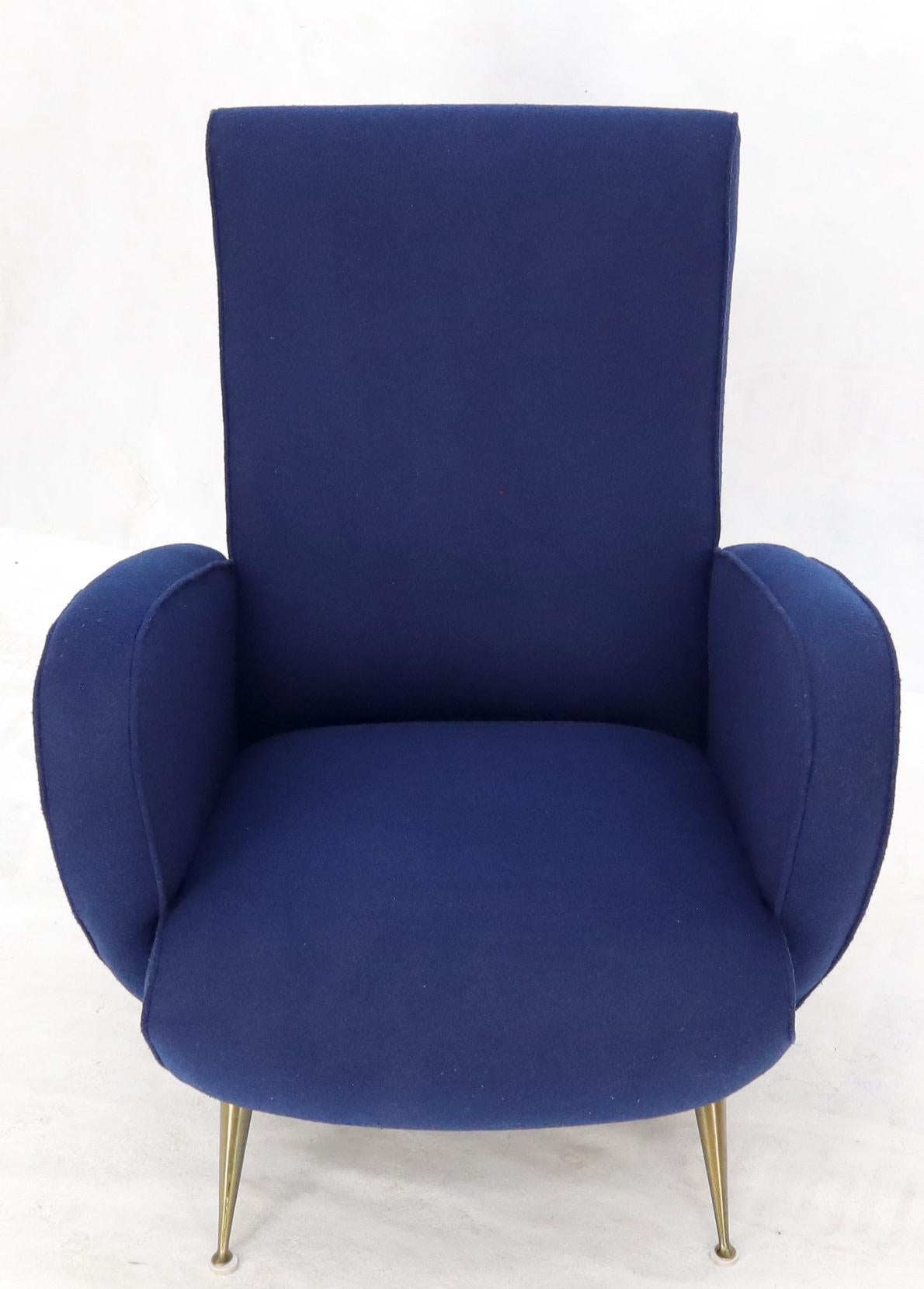 Stunning new navy blue upholstery Italian Mid-Century Modern lounge chair on cone shape brass legs. Paolo Buffa, Gio Ponti decor match.