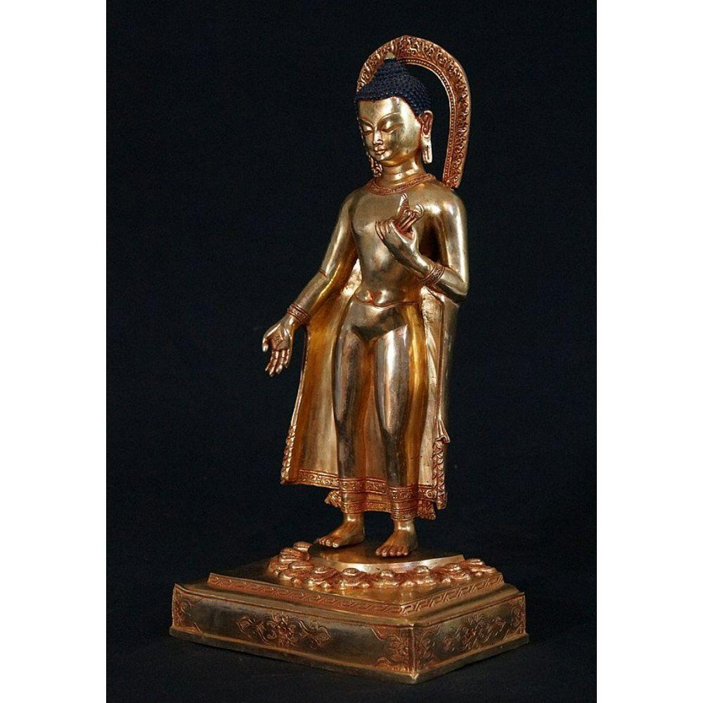 Material: bronze
Measures: 37 cm high 
20 cm wide - 11,5 cm deep
Weight: 2.719 kgs
Fire gilded with 24 krt. gold
Originating from Nepal
3 parts
Very high quality !

