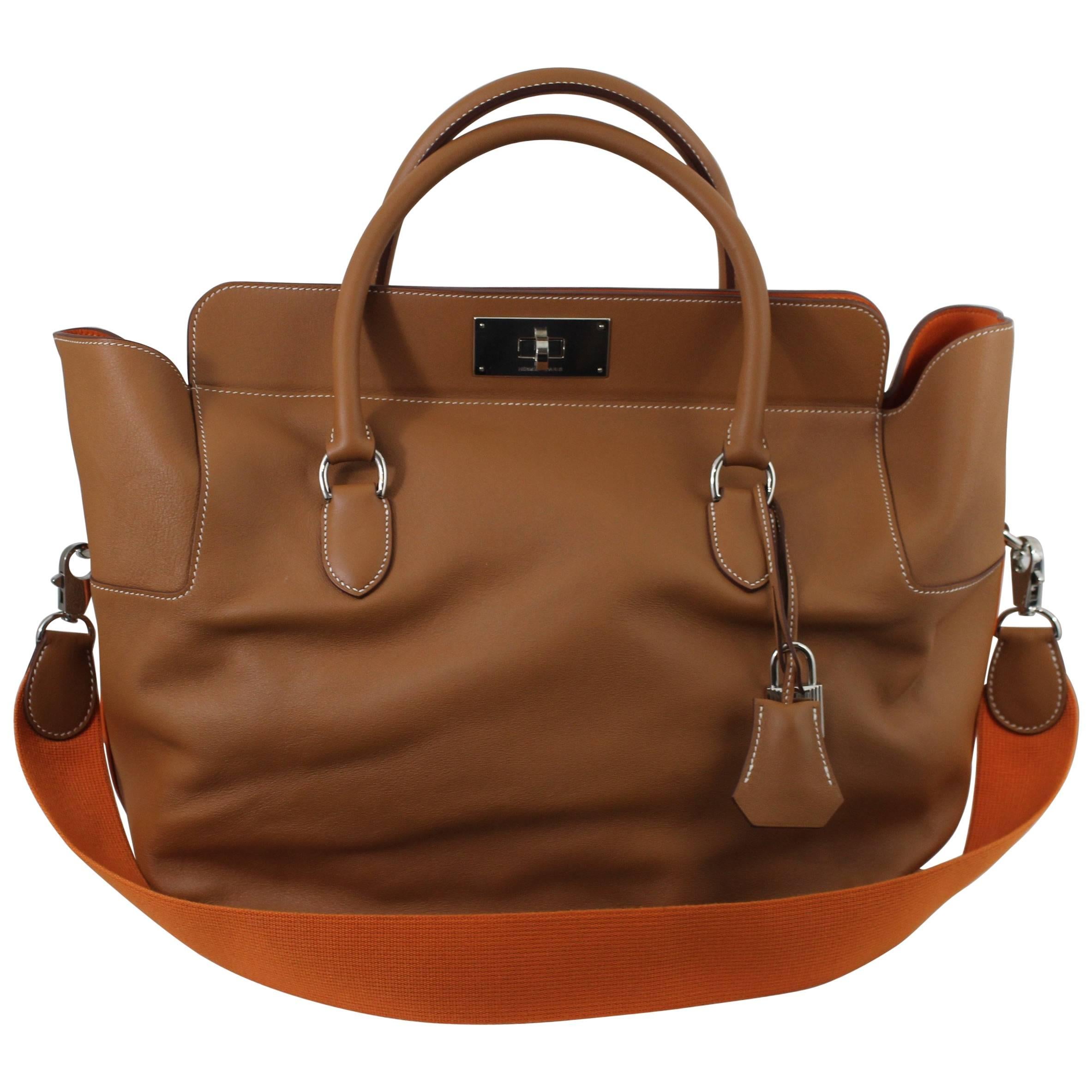 New never used Hermes Toolbox 33 GM Golden 
Orange Swift Leather. retail 8650$