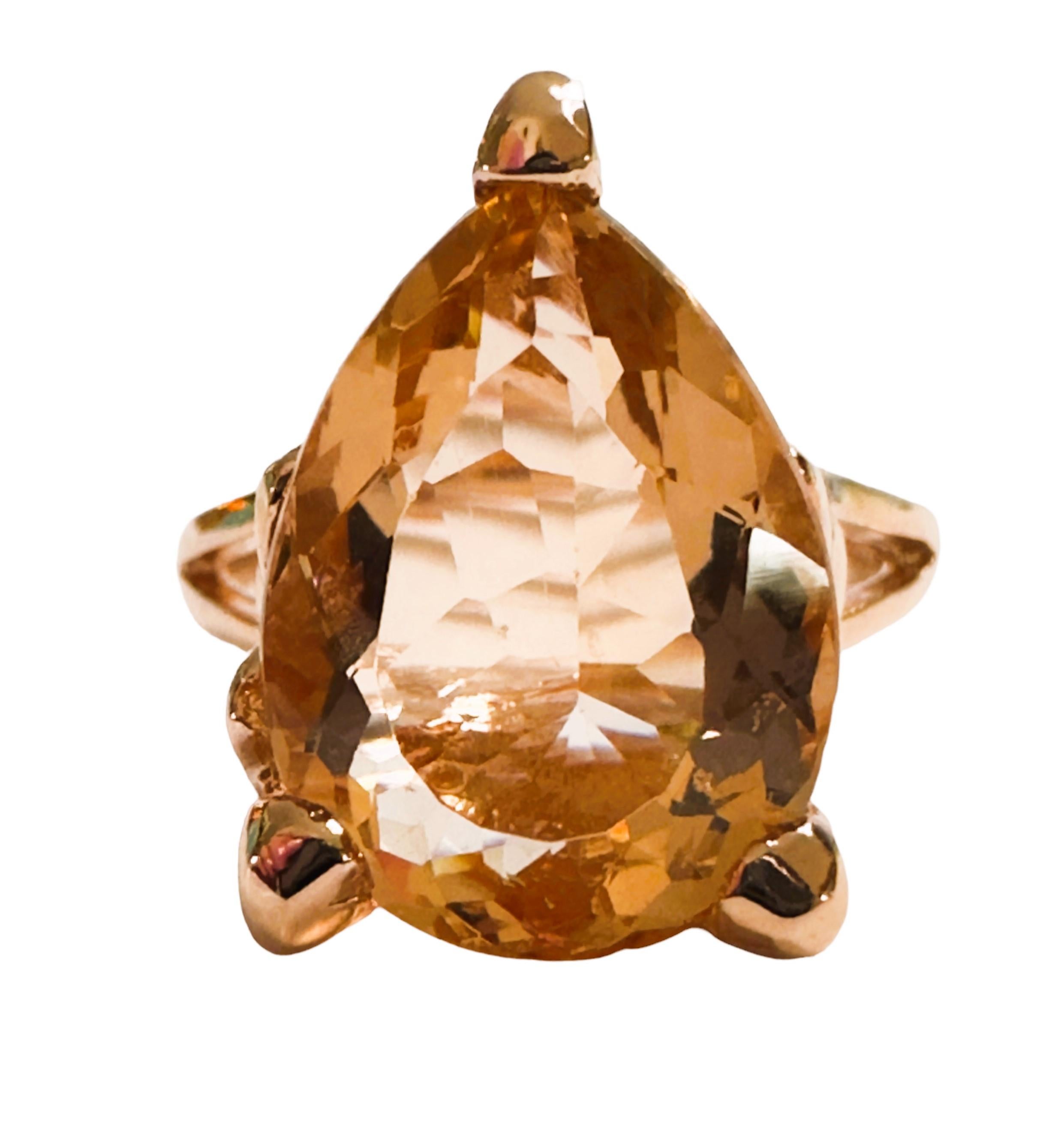The ring has a beautiful pear cut stone in a rose gold setting which really compliments the colors.  The ring is a size 7.   The stones are from Africa and is just exquisite.  It totals 5.80 Cts and is 15 x 11 mm.  The ring is sizable and can be
