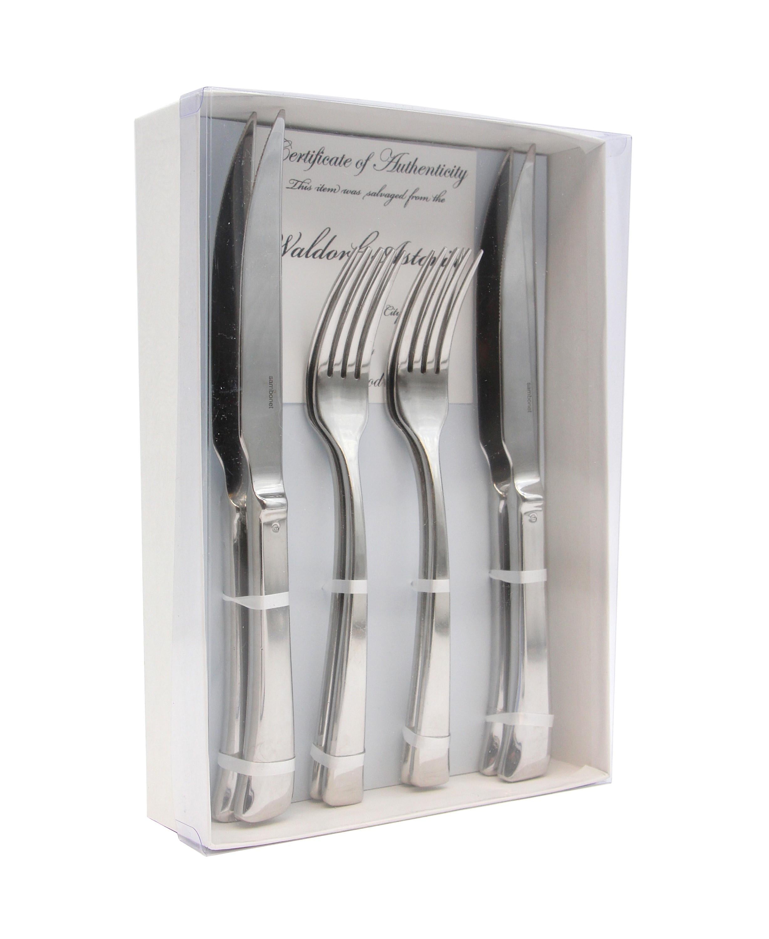 2010- high quality stainless steel new steak knife and dinner fork 8 piece set. Set includes 4 steak knives and 4 forks. Made by Sambonet in their Imagine style in Italy. These never used pieces were replacement stock from one of the NYC Waldorf