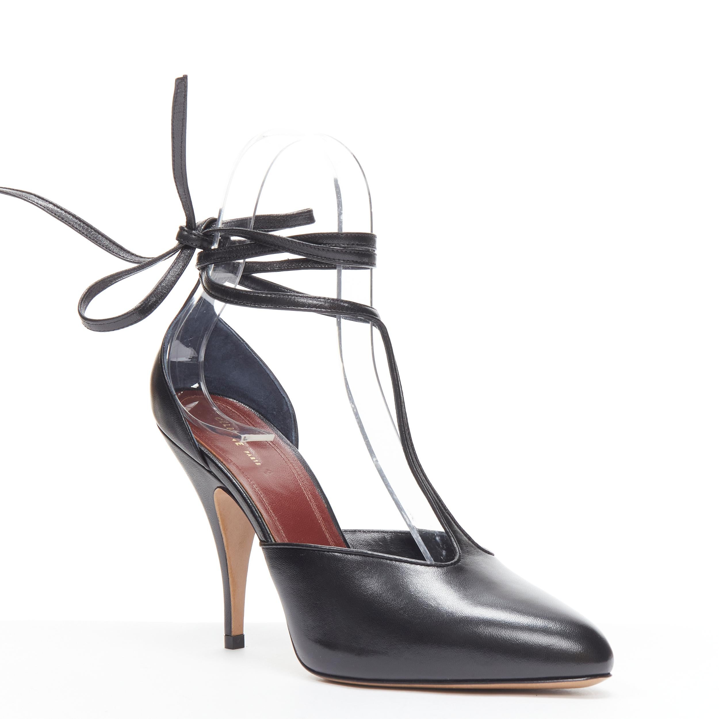 new OLD CELINE 2018 Night Out black wrap around ankle T-strap heels pump EU38 
Reference: TGAS/B02010 
Brand: Celine 
Designer: Phoebe Philo 
Model: Night Out 
Collection: Pre Fall 2018 Runway 
Material: Leather 
Color: Black 
Pattern: Solid