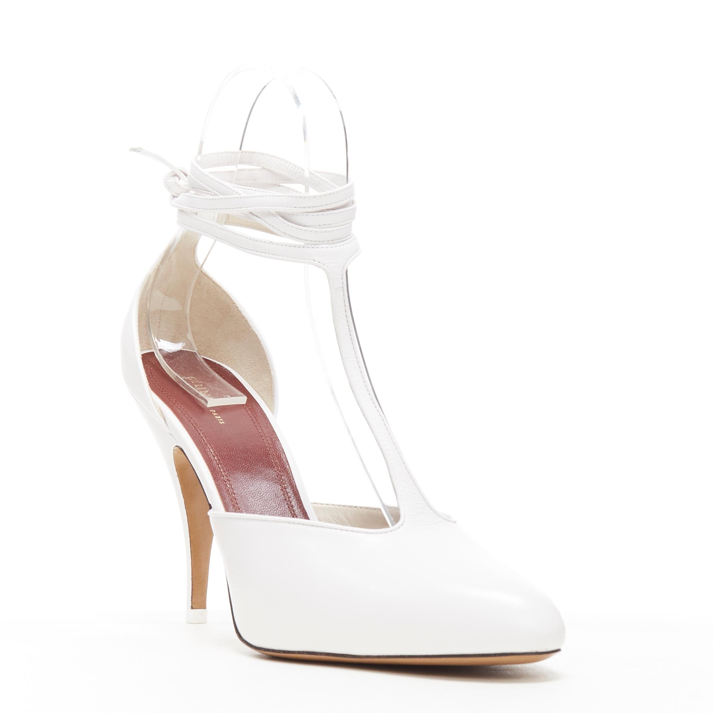 new OLD CELINE 2018 Night Out white wrap around ankle T-strap heels pump EU39
Brand: Celine
Designer: Phoebe Philo
Collection: Pre Fall 2018
Model Name / Style: Night Out
Material: Leather
Color: White
Pattern: Solid
Closure: Ankle strap
Extra