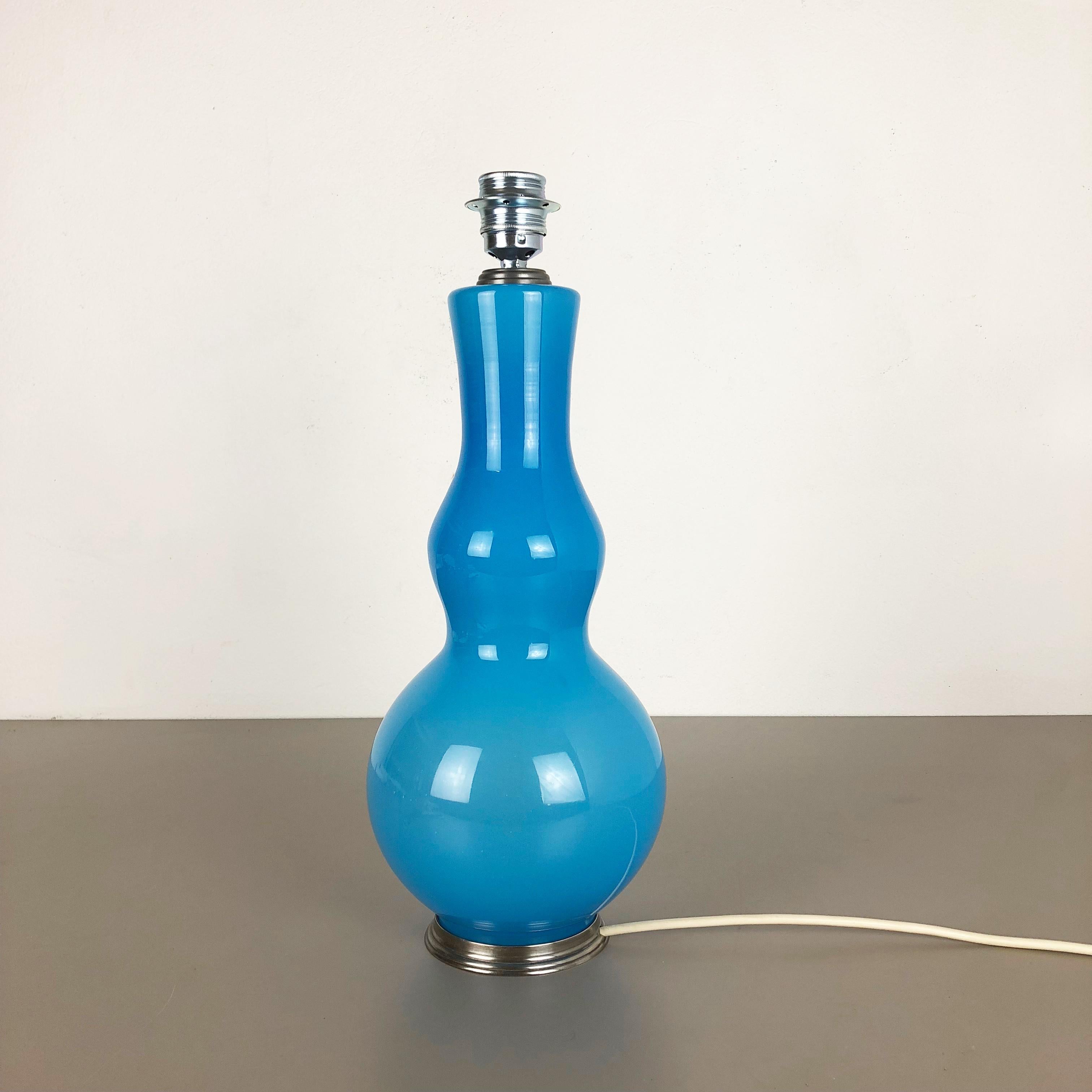 Article:

Table light opal Murano glass



Producer:

Cenedese Vetri


Origin:

Murano, Italy


Age:

1960s



This fantastic vintage table light was designed and produced by Cenedese Vetri in the 1960s in Murano, Italy. The