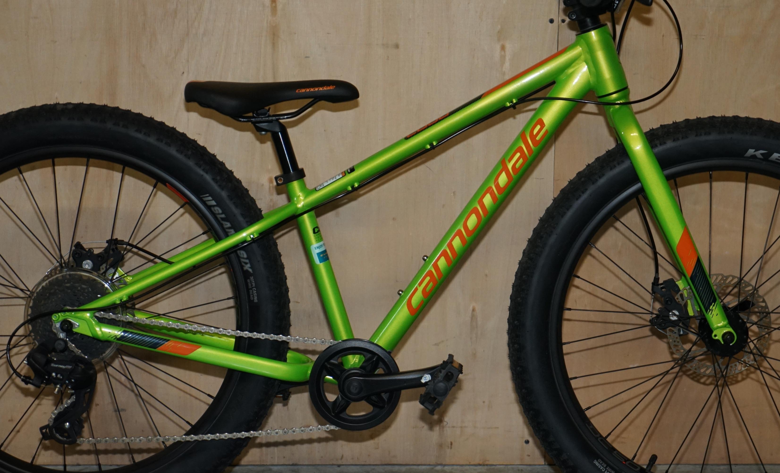 We are delighted to offer for sale this new old ex shop display Children's Cannondale Cujo 24 inch wheel Fat Bike

This bike I had in my old bike shop for my son, he never learned to ride so never used it, its sat as the day it was built in one of