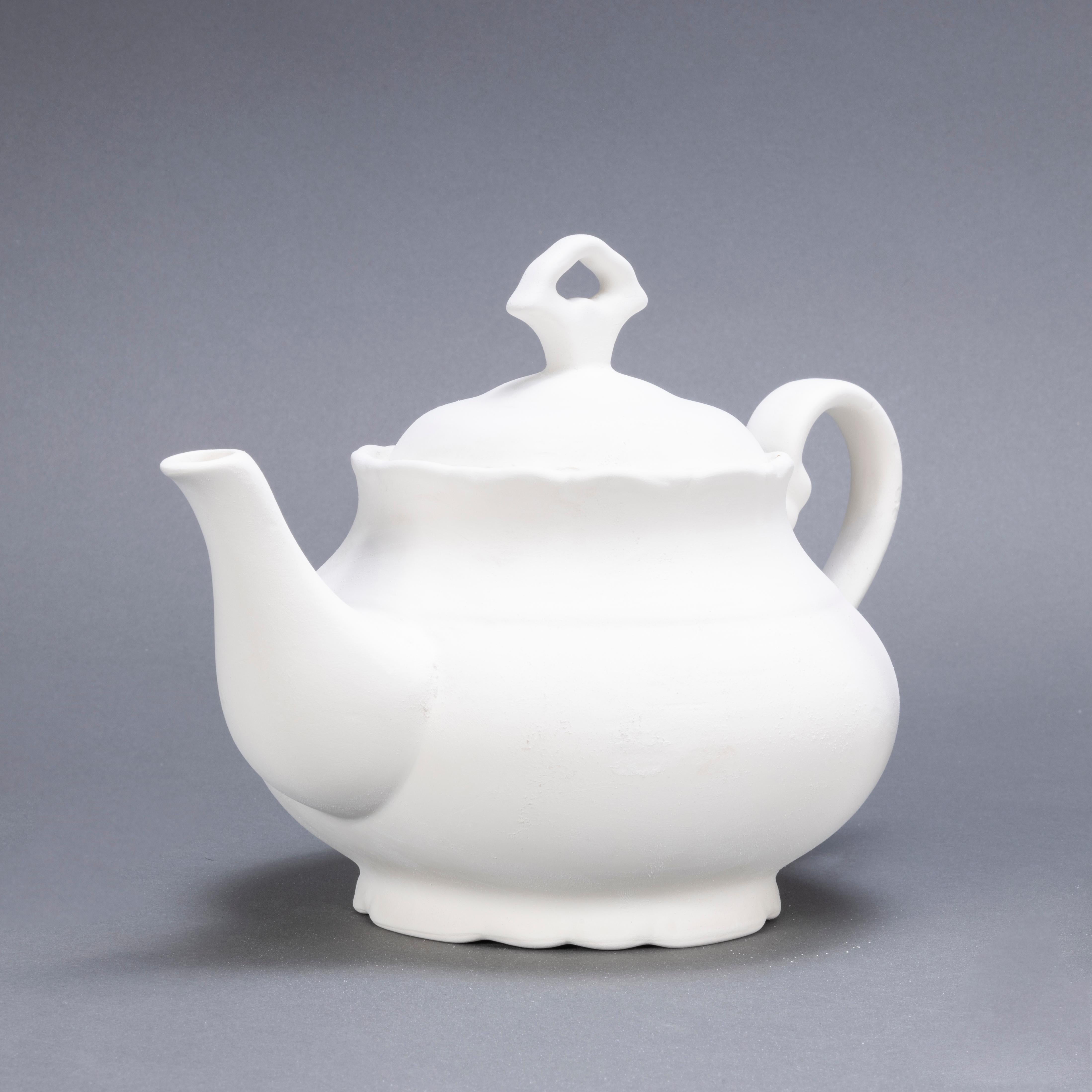 New Old Stock Czech Raw Ceramic - Teapot. 

This white raw ceramic teapot was made in Czech in the late 20th Century. We recently cleared a ceramics factory in the Czech republic, it closed in the eighties and had been sitting sealed up since then.