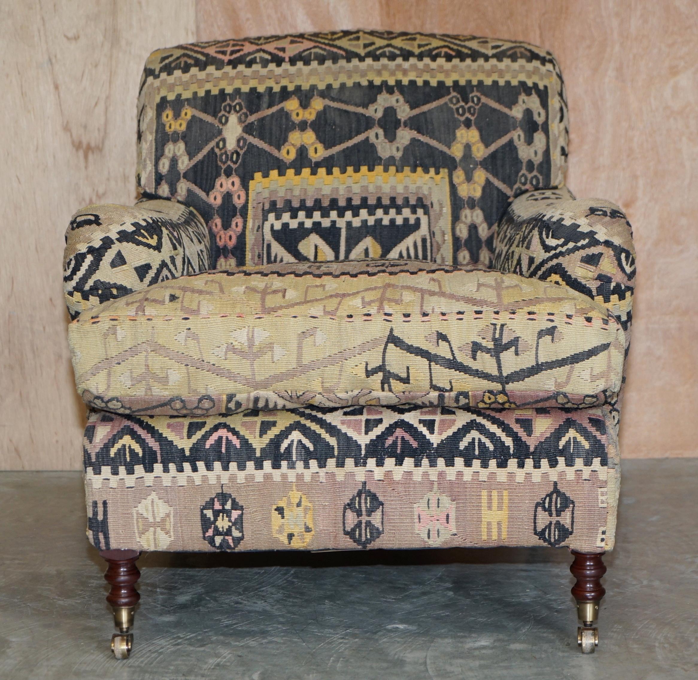 We are delighted to offer for sale this sublime and highly collectable (part of a suite) New Old Stock George Smith Signature Scroll Arm Aztec Kilim Armchair with oversized feather filled cushion. 

This chair is as mentioned part of a suite, I