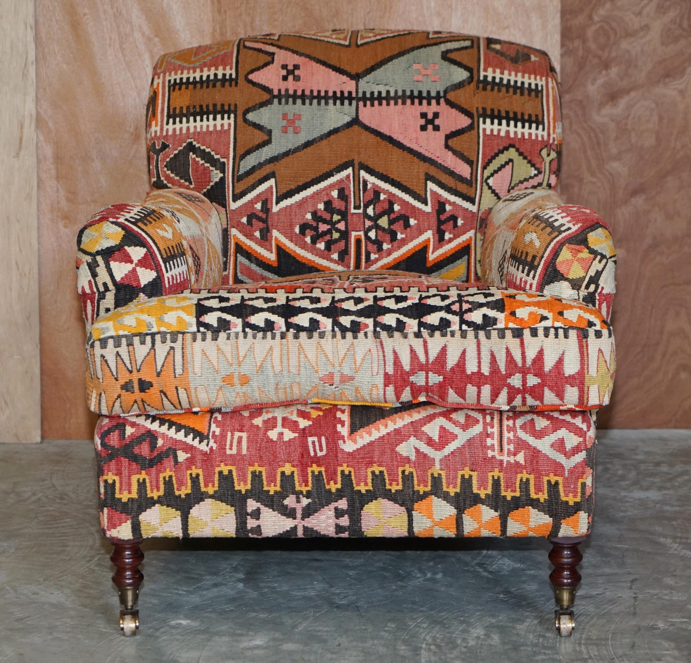 We are delighted to offer this sublime and highly collectable (part of a suite) new old stock George Smith Signature Scroll Arm Aztec Kilim armchair with oversized feather filled cushion. 

This chair is as mentioned part of a suite, I have two of