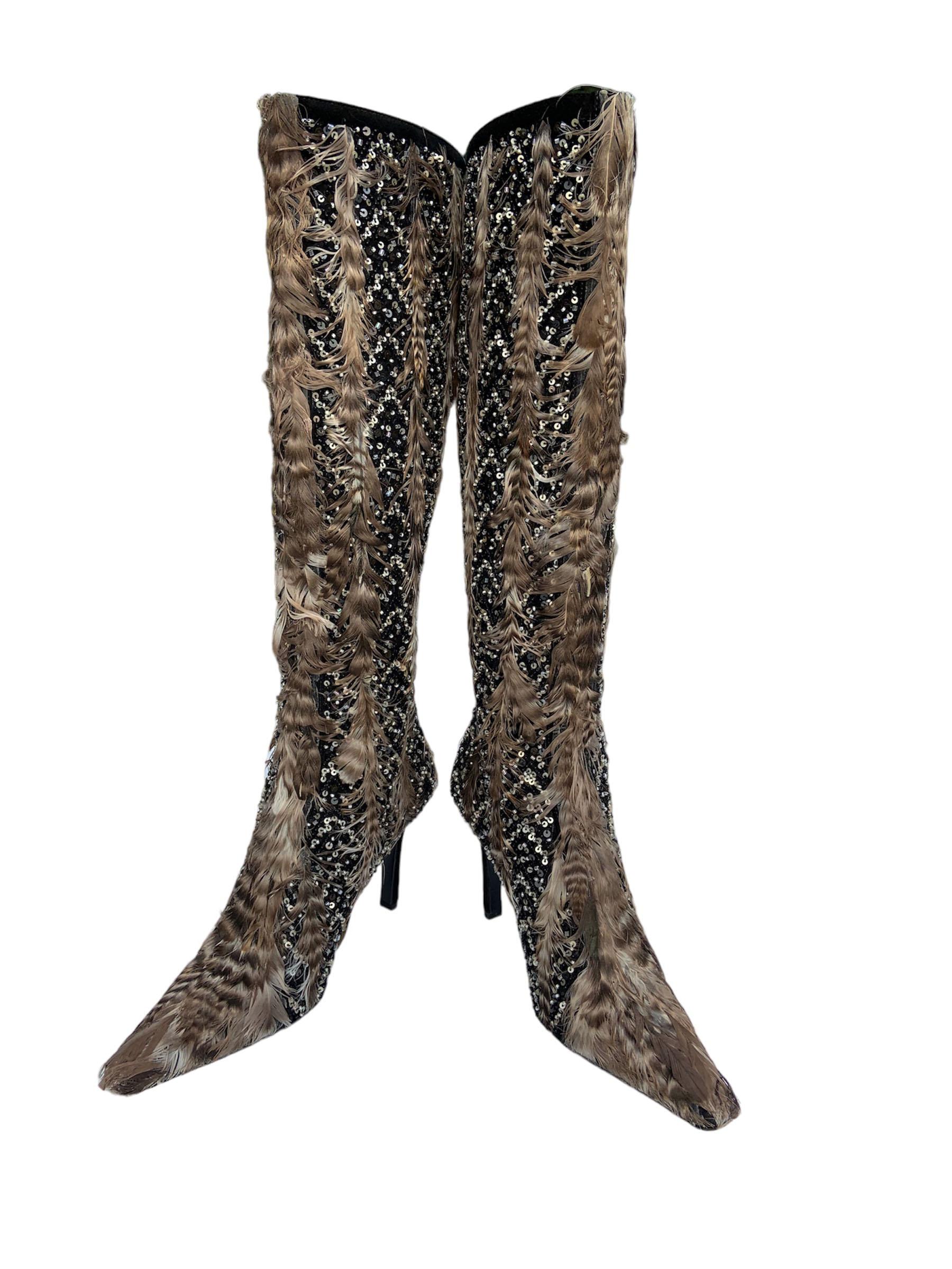 Vintage and Brand New ! 
For Memories about Unforgettable Oscar de la Renta ! 
Oscar de la Renta Black Suede Knee Boots
Italian size 36.5 - US 6.5
Fully Embellished with Black and Clear Beads, Black and Silver Tone Sequins, Real Feathers.
Black
