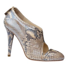 OSCAR DE LA RENTA Nudefarbener Python-Stiefel 