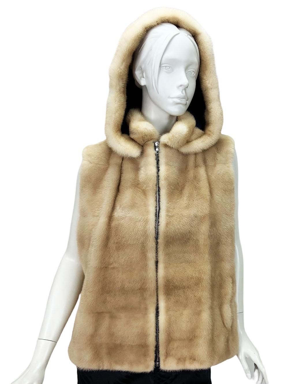 New Oscar De La Renta Palomino Mink Hooded Vest
Designer size - M
100% Real Mink ( Fur Origin USA) , Detachable Hood, Two Side Pockets, Fully Lined in Silk,  Zipper Closure.
Measurements: Length - 24 inches, Bust - 40 inches.
Made in USA.
New with
