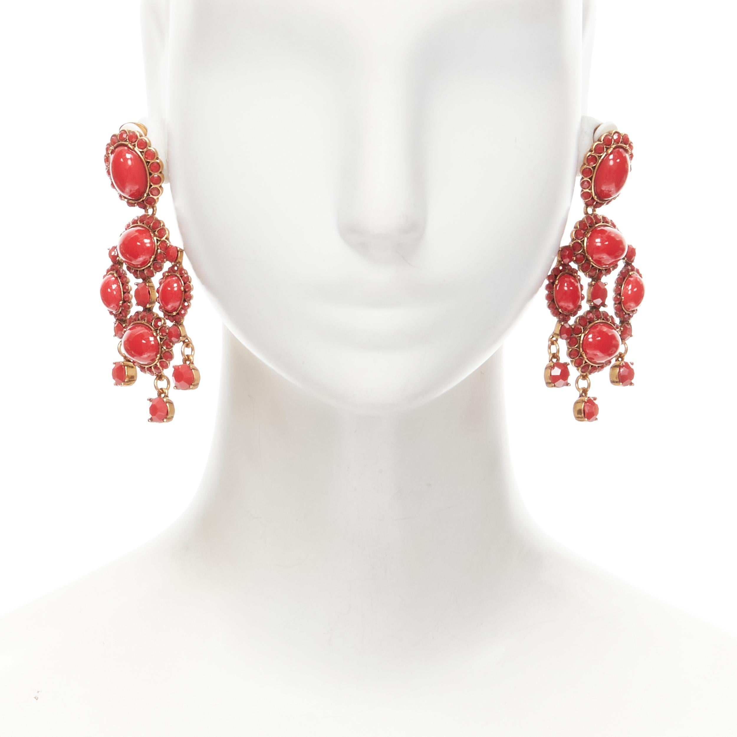 new OSCAR DE LA RENTA red gold oval rhinestone chandelier clip on earrings 
Reference: TGAS/B01821 
Brand: Oscar de la Renta 
Designer: Oscar de la Renta 
Material: Metal 
Color: Red 
Pattern: Solid 
Closure: Clip ON 
Extra Detail: Antique gold