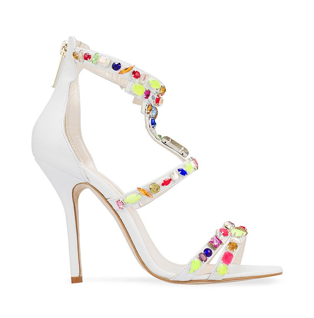 New Oscar De LaRenta *Simona* White Leather Sandals
Designer size 38
100% Leather,  Multi-color Jewel Embellishments Throughout, Covered Heels and Gold-tone Zip Closure at Counters, Super Light Weight. 
Heel Height - 4.25 inches, Insole - 9 7/8