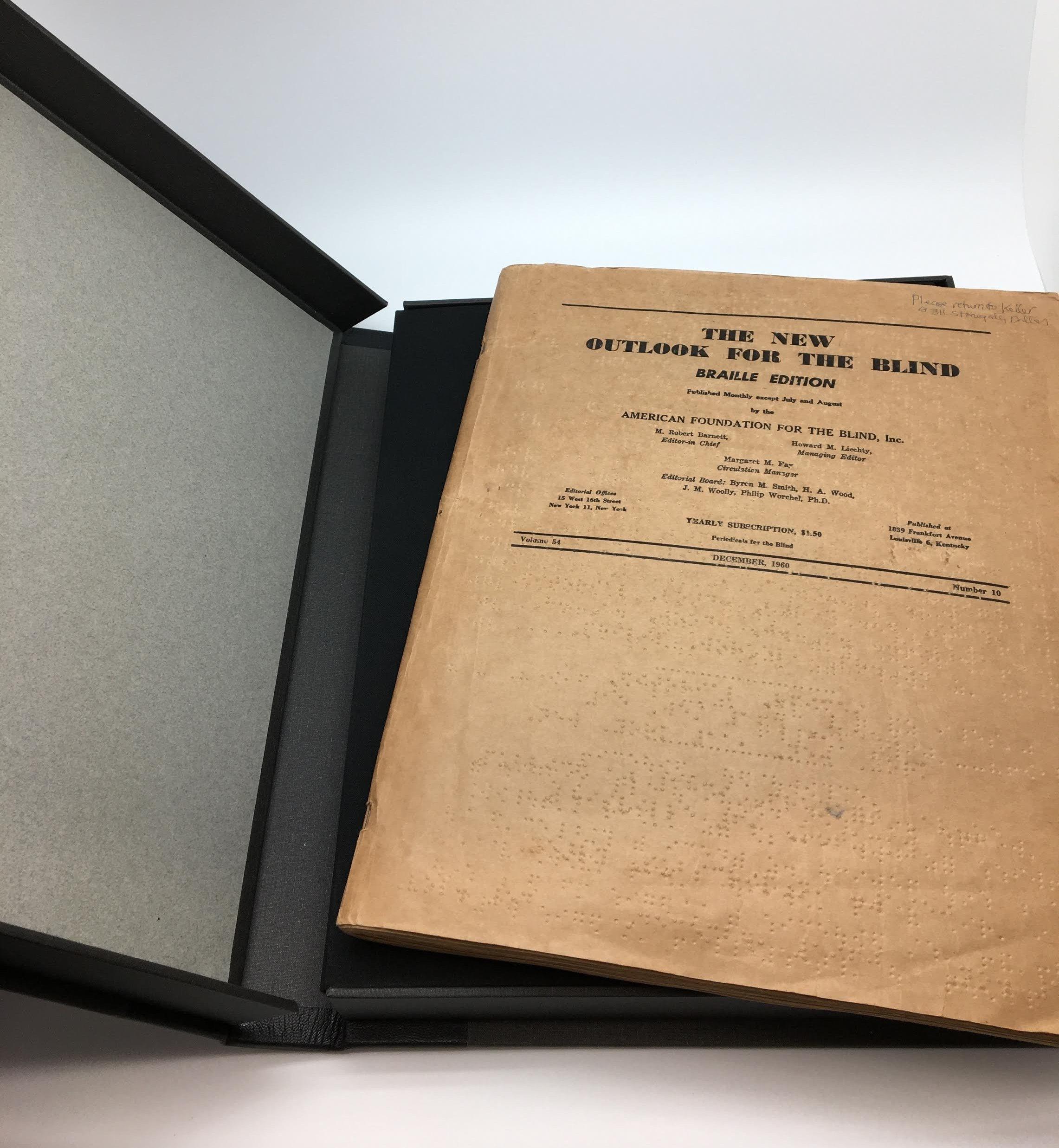 This is Helen Keller’s personal reading copy of The New Outlook for the Blind, December 1960, Volume 54, Number 10. The periodical is inscribed in the upper right corner. Inscription reads: “Please return to Keller, 5311 Stonegate, Dallas” in blue