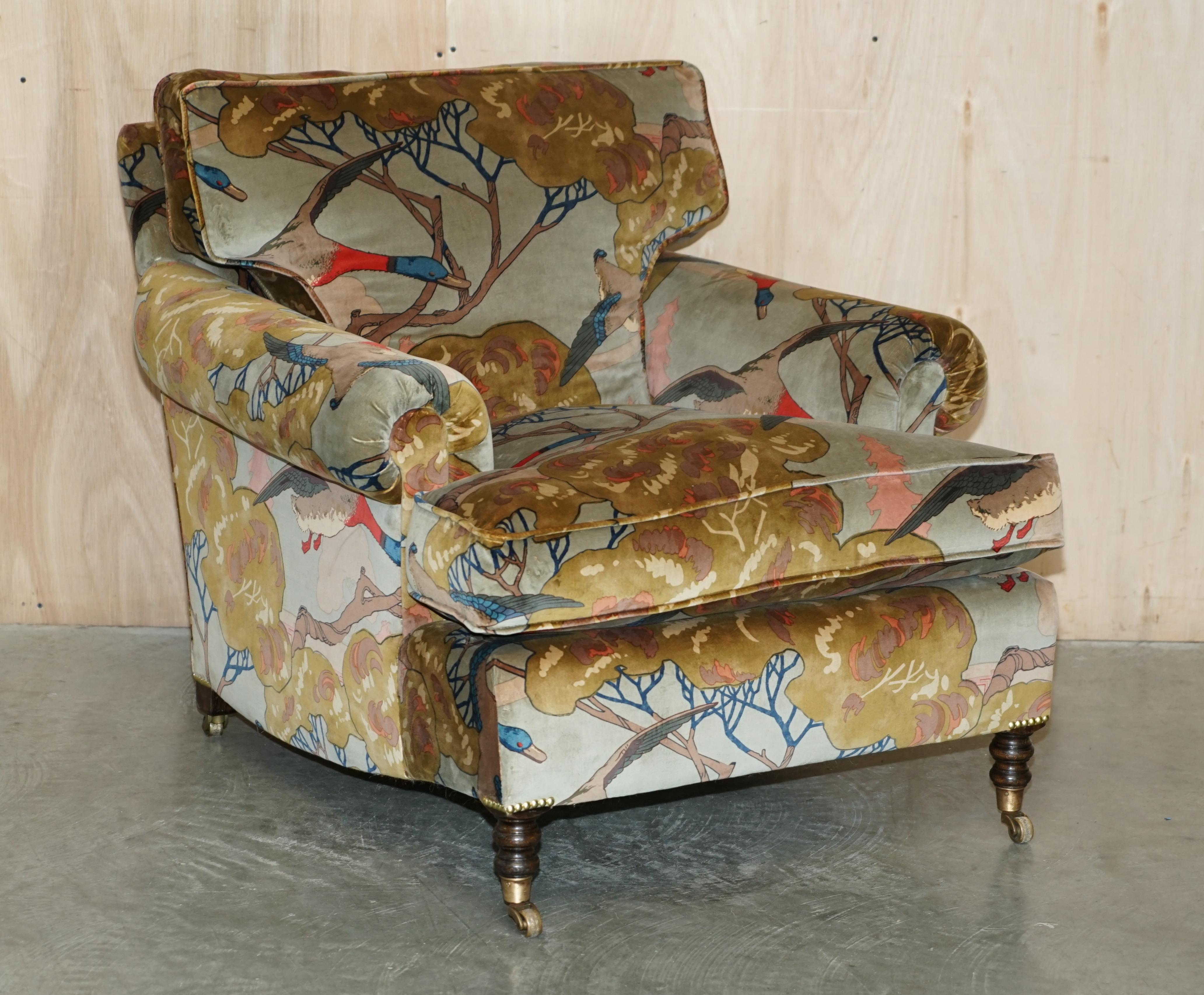 We are delighted to offer for sale this pair of fully refurbished, George Smith Signature Scroll arm armchairs and matching footstool upholstered in Mulberry Flying Ducks velvet

These are a brand newly reupholstered and restored to the finest