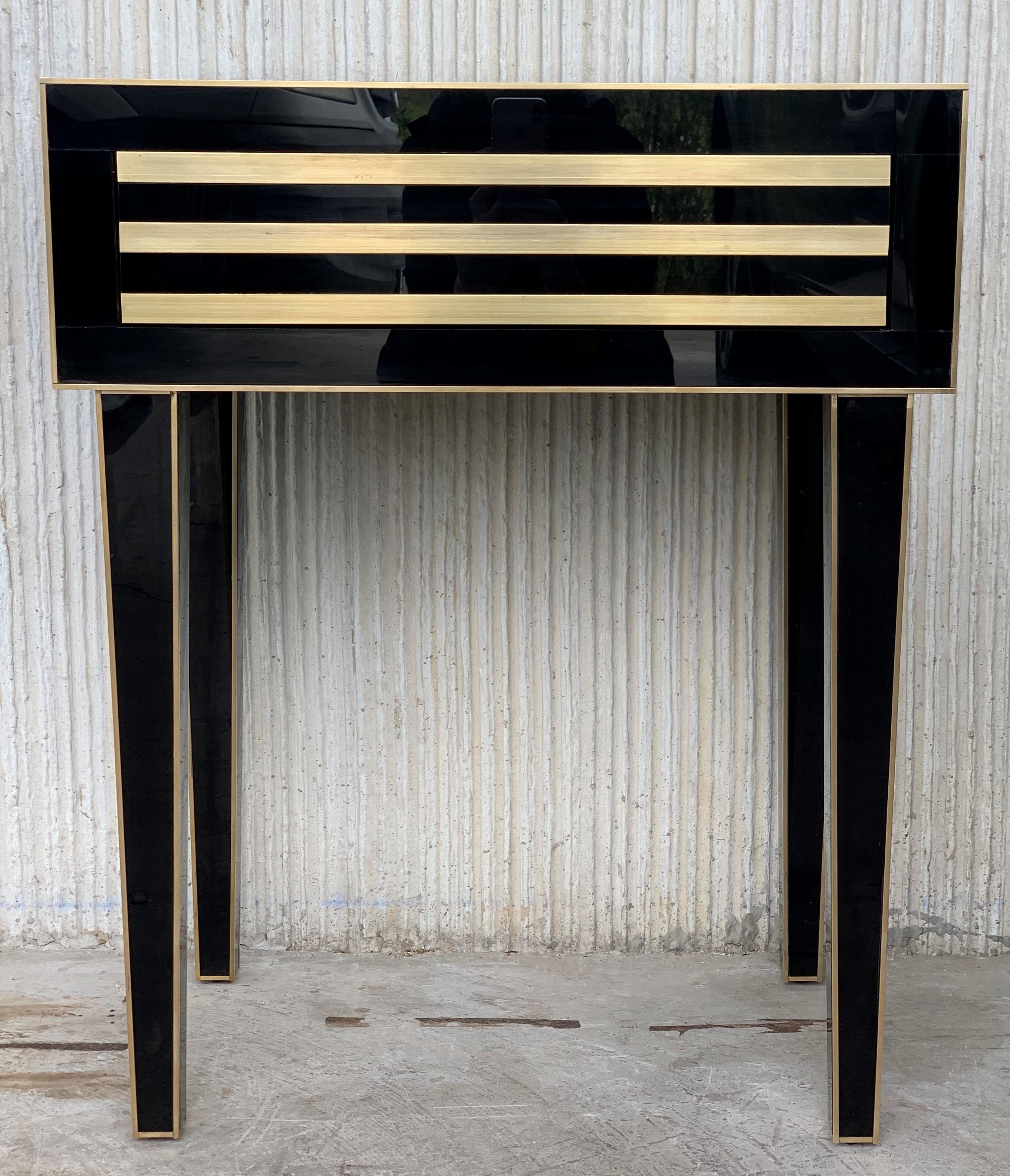 New pair of black glass and brass nightstands with one-drawer in black and white, mirrored details in drawers.
Soft push system opening with brake in drawers.
Two glass and brass handles


We can make it in custom size or custom color upon