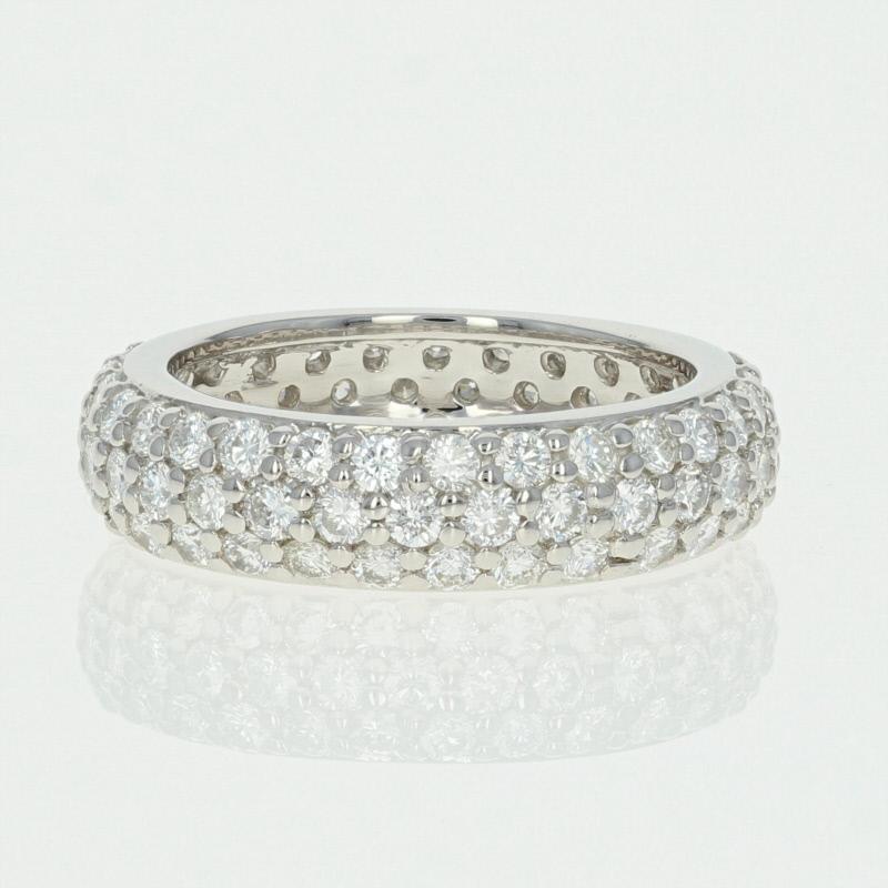 Celebrate your unique love story with this radiant NEW wedding anniversary band! Crafted in heirloom-quality platinum, this ring is fashioned in a symbolic eternity design which sparkles with a brilliant array of pave set white diamonds. 

This ring