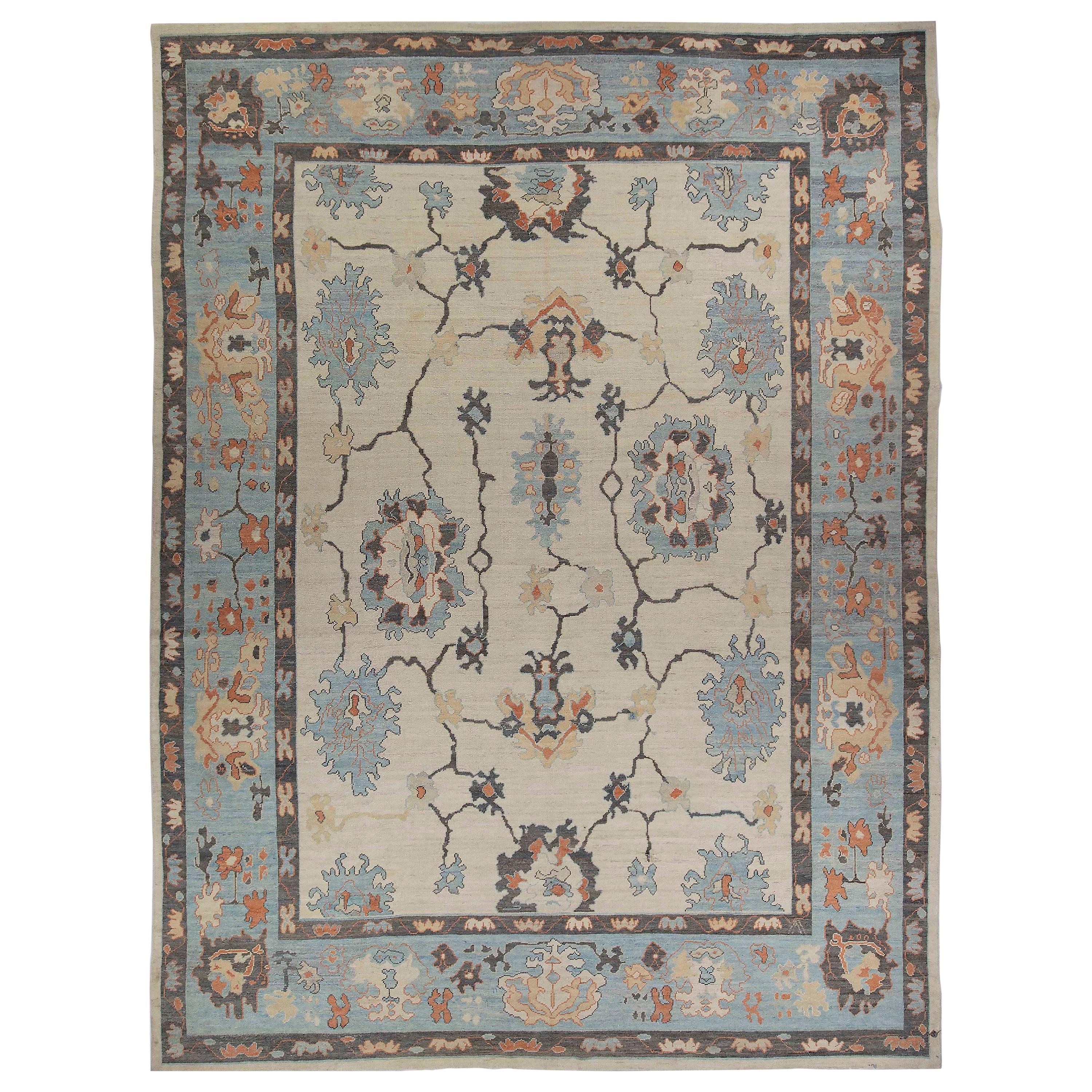 New Persian Oushak Style Rug with Black and Blue Floral Details on Ivory Field For Sale
