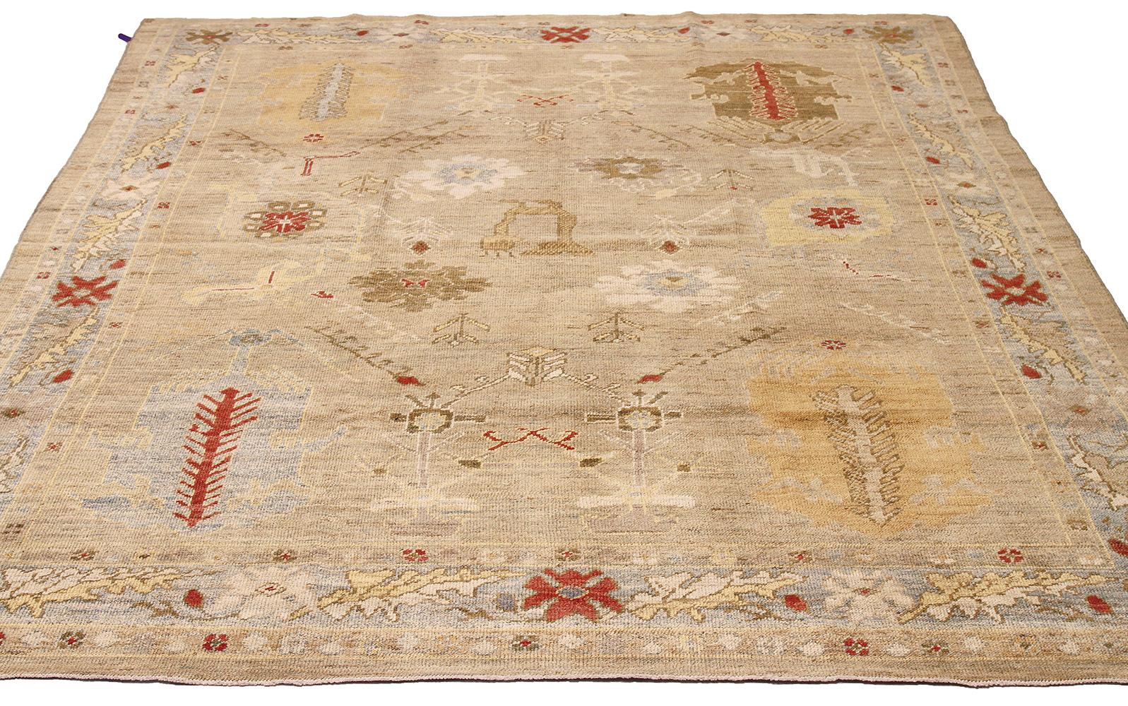 New Persian rug made of handwoven sheep’s wool of the finest quality. It’s colored with organic vegetable dyes that are certified safe for humans and pets alike. It features multicolored botanical and floral details associated with Oushak weaving