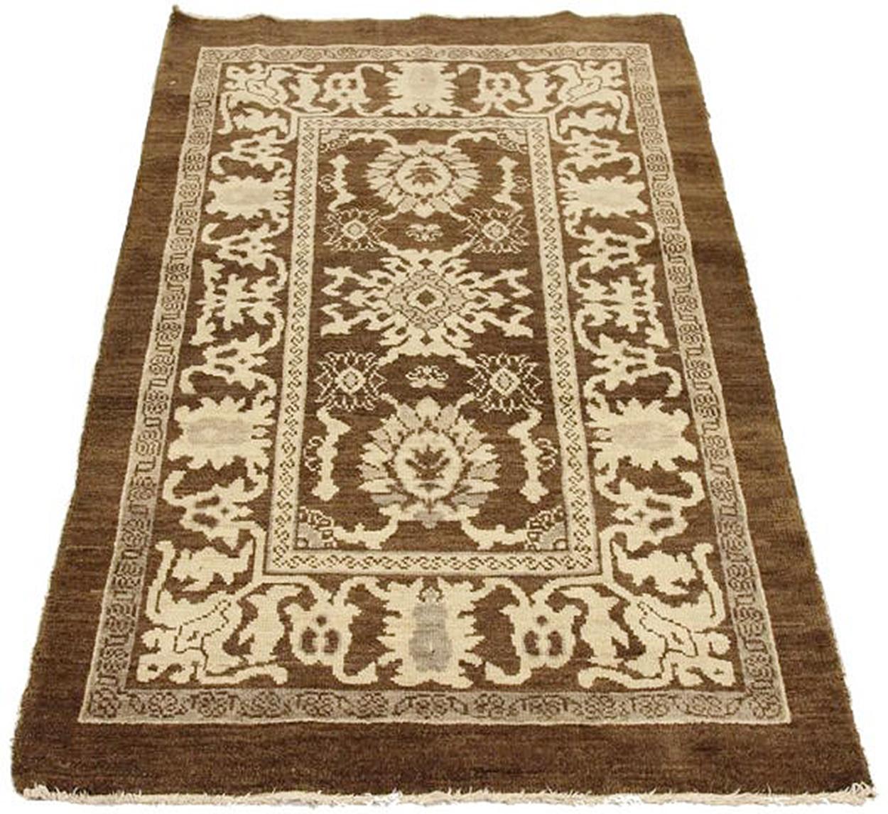 New handmade Persian area rug 11520 crafted from high-quality sheep’s wool and colored with eco-friendly vegetable dyes that are proven safe for humans and pets alike. It’s a Classic Sultanabad design showcasing a brown field with prominent Ivory
