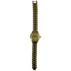 New Piaget 18 Karat Yellow Gold Bracelet Watch with Double Row Diamond Bezel