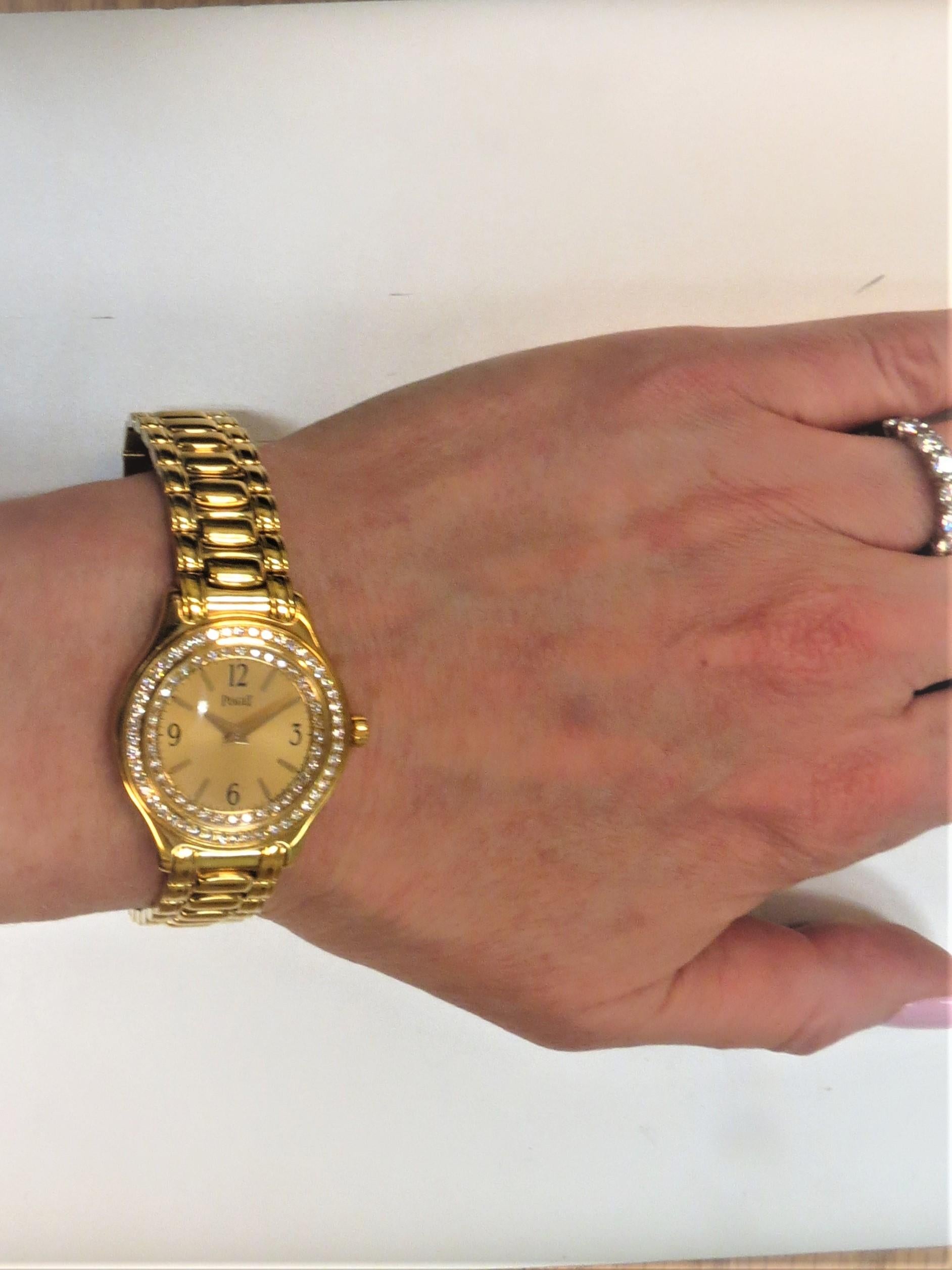 Contemporary New Piaget 18 Karat Yellow Gold Bracelet Watch with Double Row Diamond Bezel For Sale