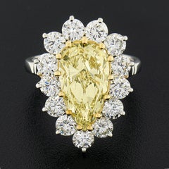18k Gold 5.64ctw GIA Fancy Light Yellow Pear Diamond w/ Halo Engagement Ring