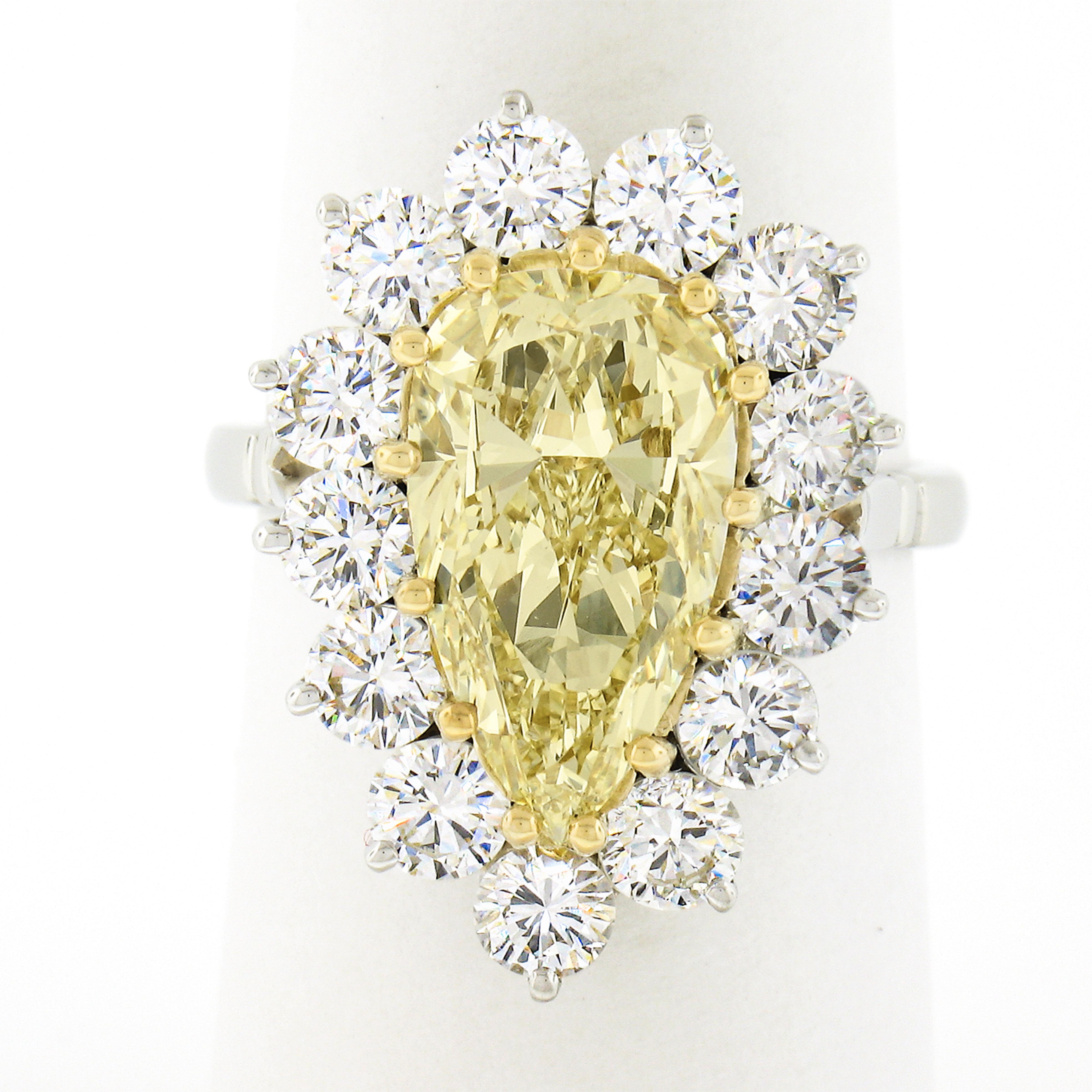 18k Gold 5.64ctw GIA Fancy Light Yellow Pear Diamond w/ Halo Engagement Ring In New Condition In Montclair, NJ