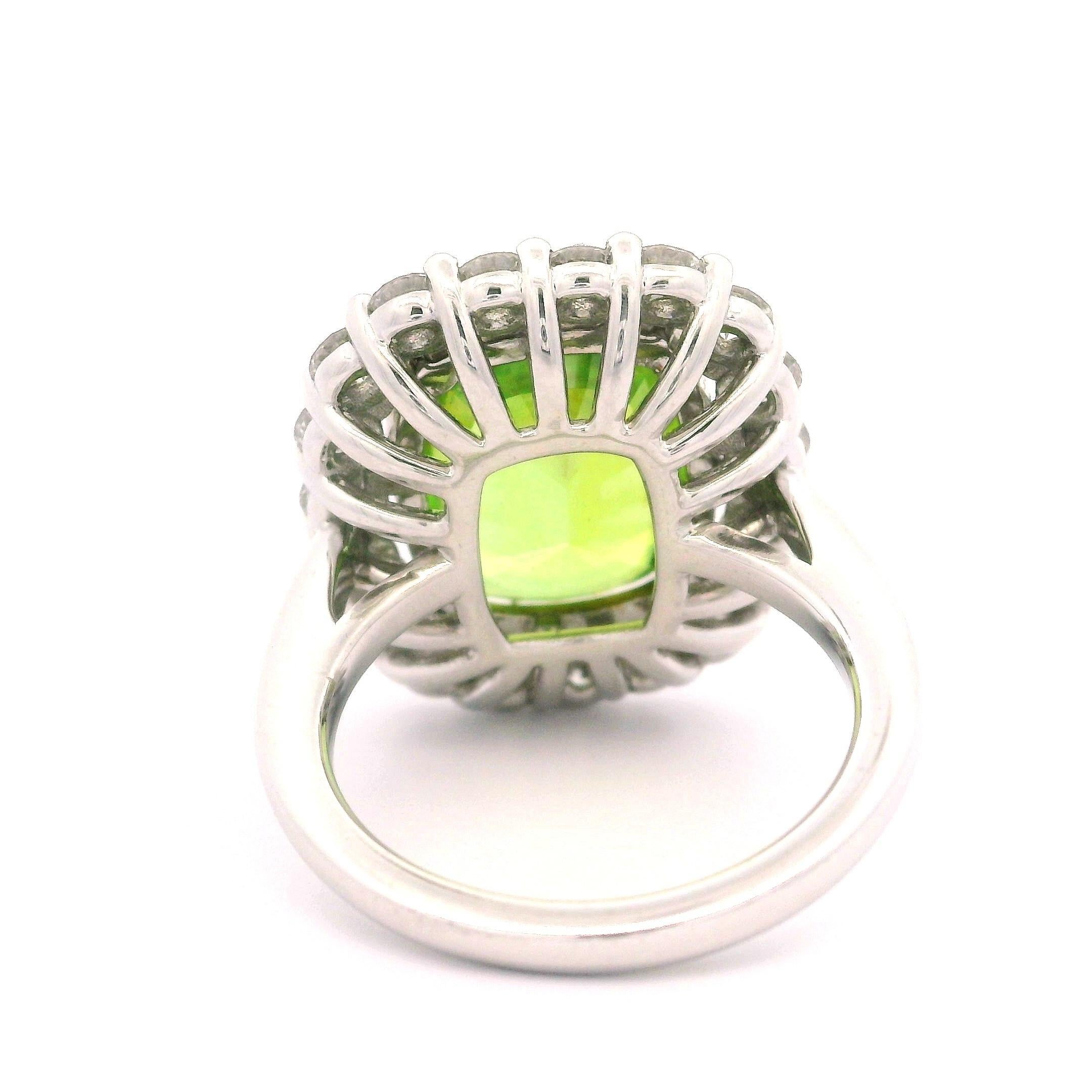 --Stone(s):--
(1) Natural Genuine Sphene - Cushion Cut - Prong Set - Yellowish Green Color - 8.82ct (exact - certified)
** See Certification Details Below for Complete Info **
(19) Natural Genuine Diamonds - Round Brilliant Cut - Prong Set - F/G
