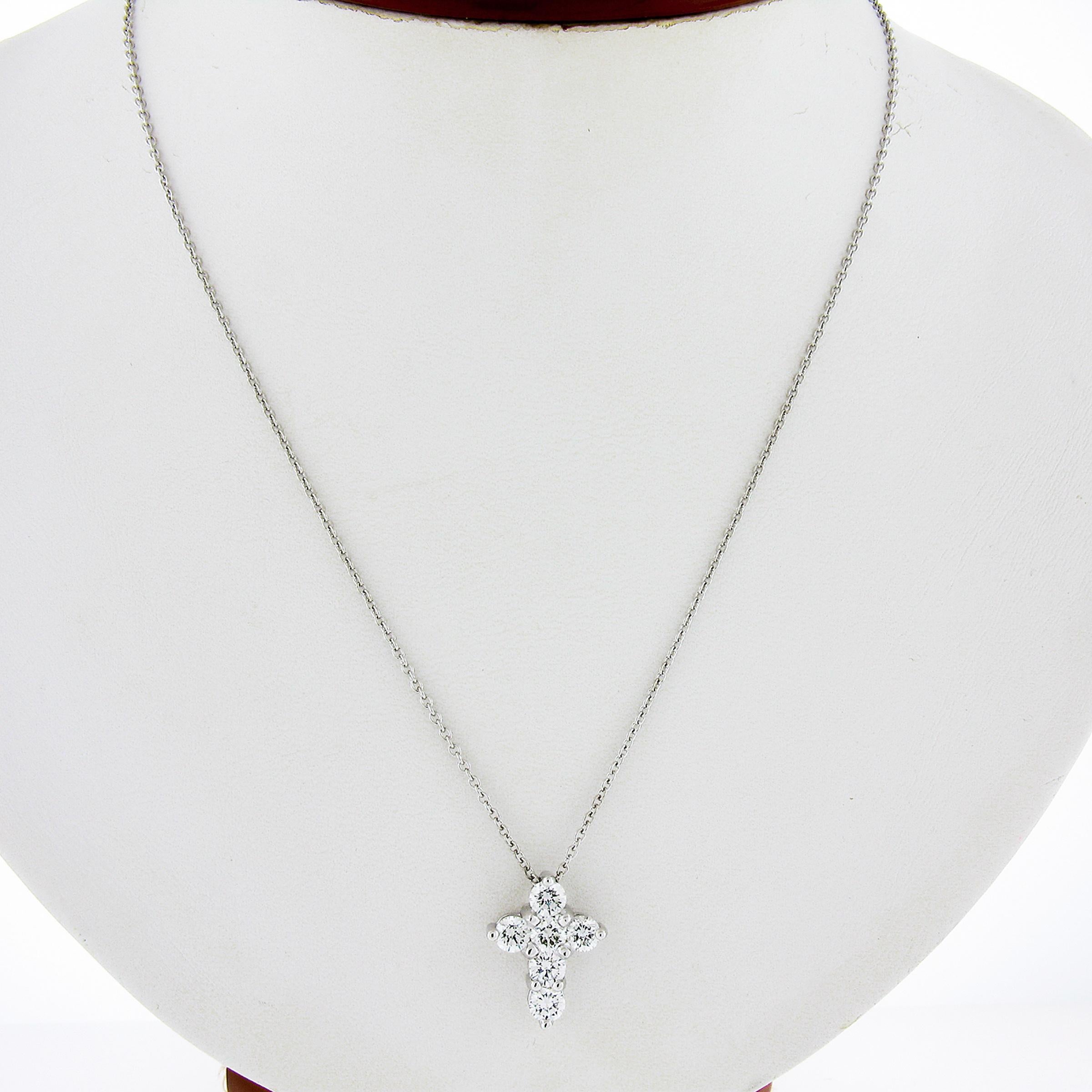 This new elegant very well made diamond cross pendant is crafted in solid platinum. It features a lovely meaty design with the high quality nice large diamonds weighing exactly 1.53ctw. This pendant slides on an adjustable 16 or 18 inch cable link