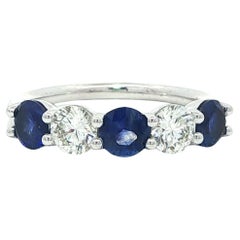 Nuovo anello in platino con diamante e zaffiro blu di alta qualità a basso profilo