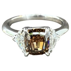 New Platinum 2.28ctw GIA Unique Step Cut Fancy Orangy Brown Diamond 3 Stone Ring