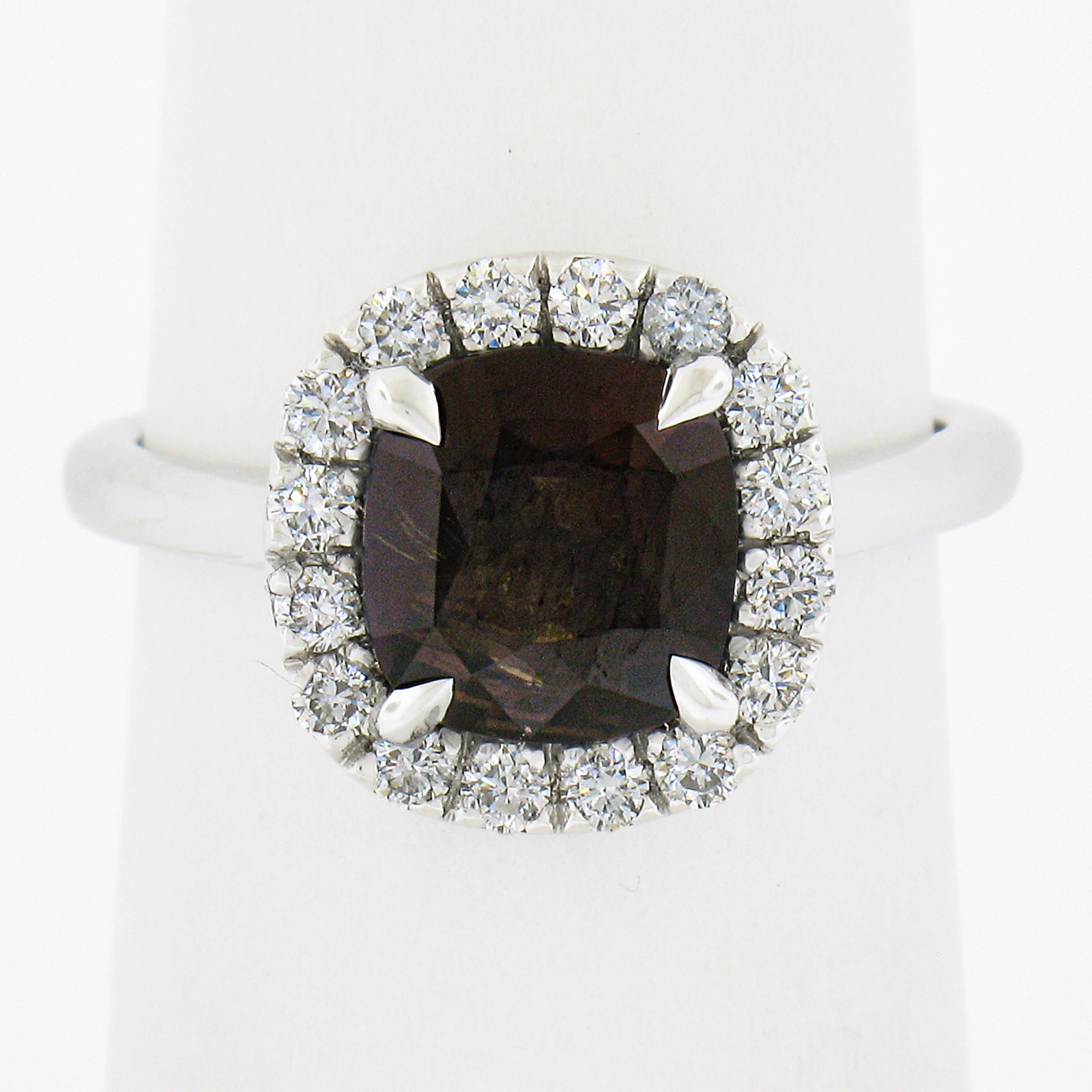 Like a moth to a flame, we are bewitched by this magical stone. A wonderfully cushion cut 2.04 carat Ceylon alexandrite with strong color change. Most alexandrites have wonky cuts to save carat weight but ours is perfectly proportioned. Alexandrite