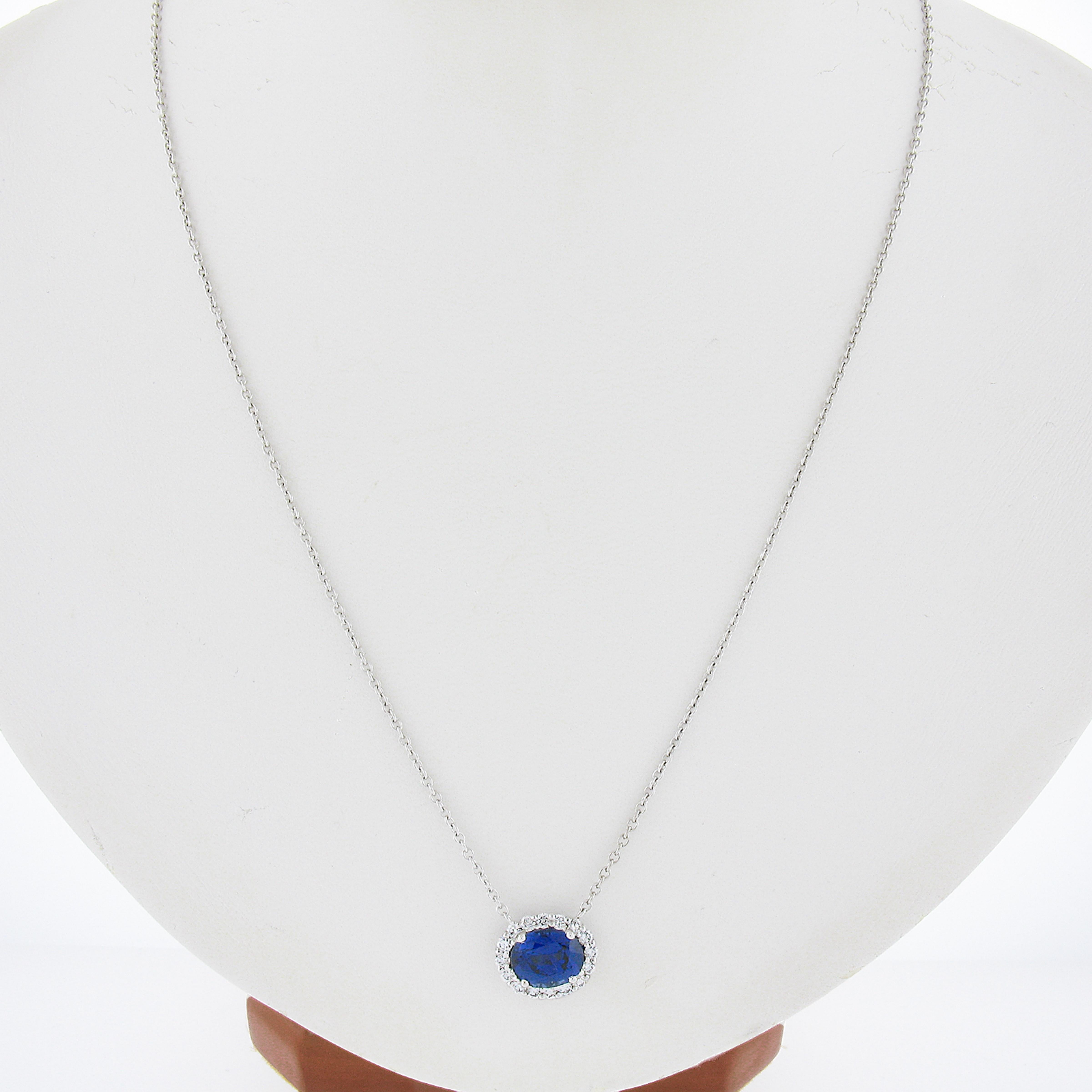 --Stone(s):--
(1) Natural Genuine Sapphire - Oval Brilliant Cut - Prong Set - Vivid Royal Blue Color - 2.05ct (exact - certified)
** See Certification Details Below for Complete Info **
(16) Natural Genuine Diamonds - Round Brilliant Cut - Prong Set