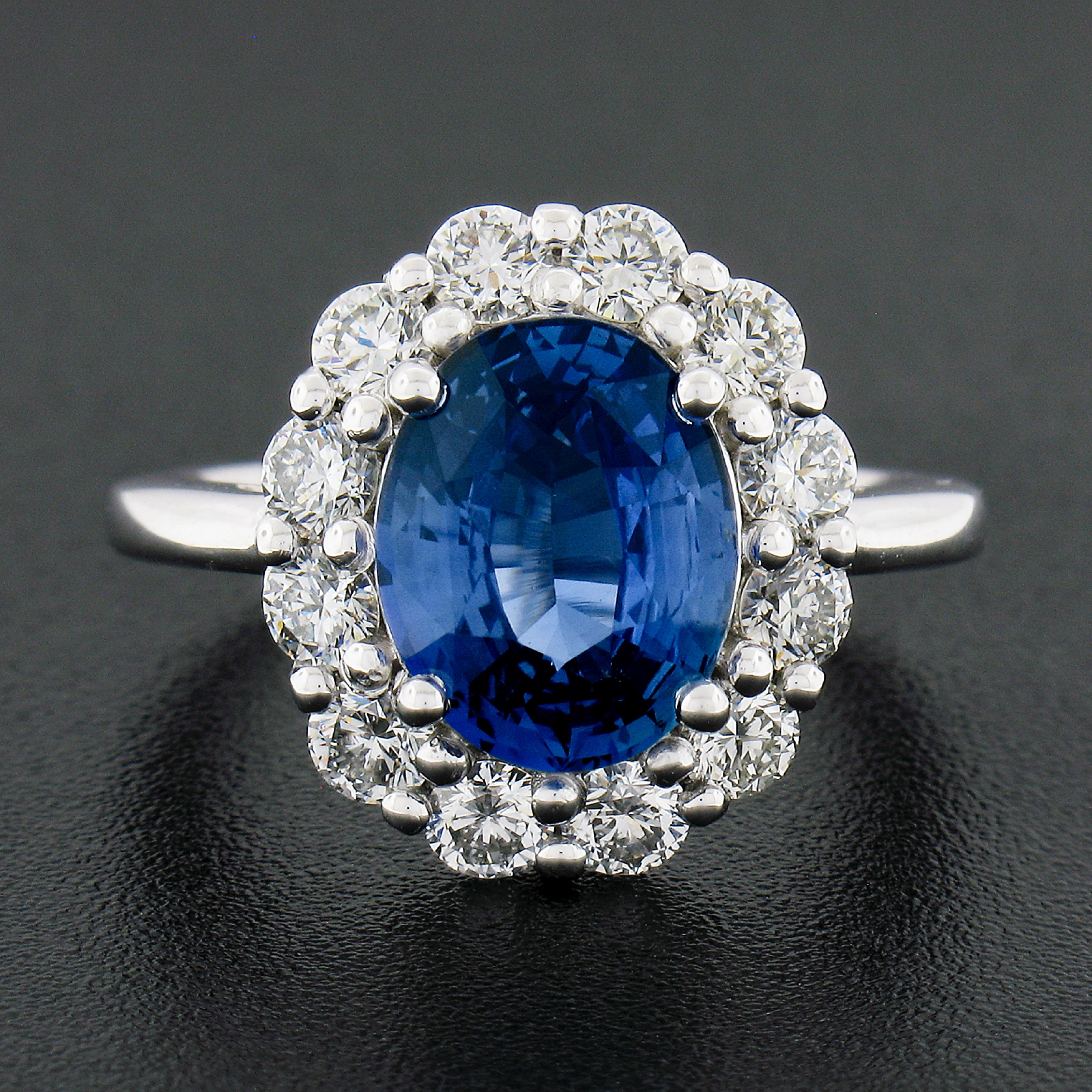 Oval Cut New Platinum 4.79ctw GIA No Heat Oval Blue Sapphire & Diamond Halo Cocktail Ring For Sale