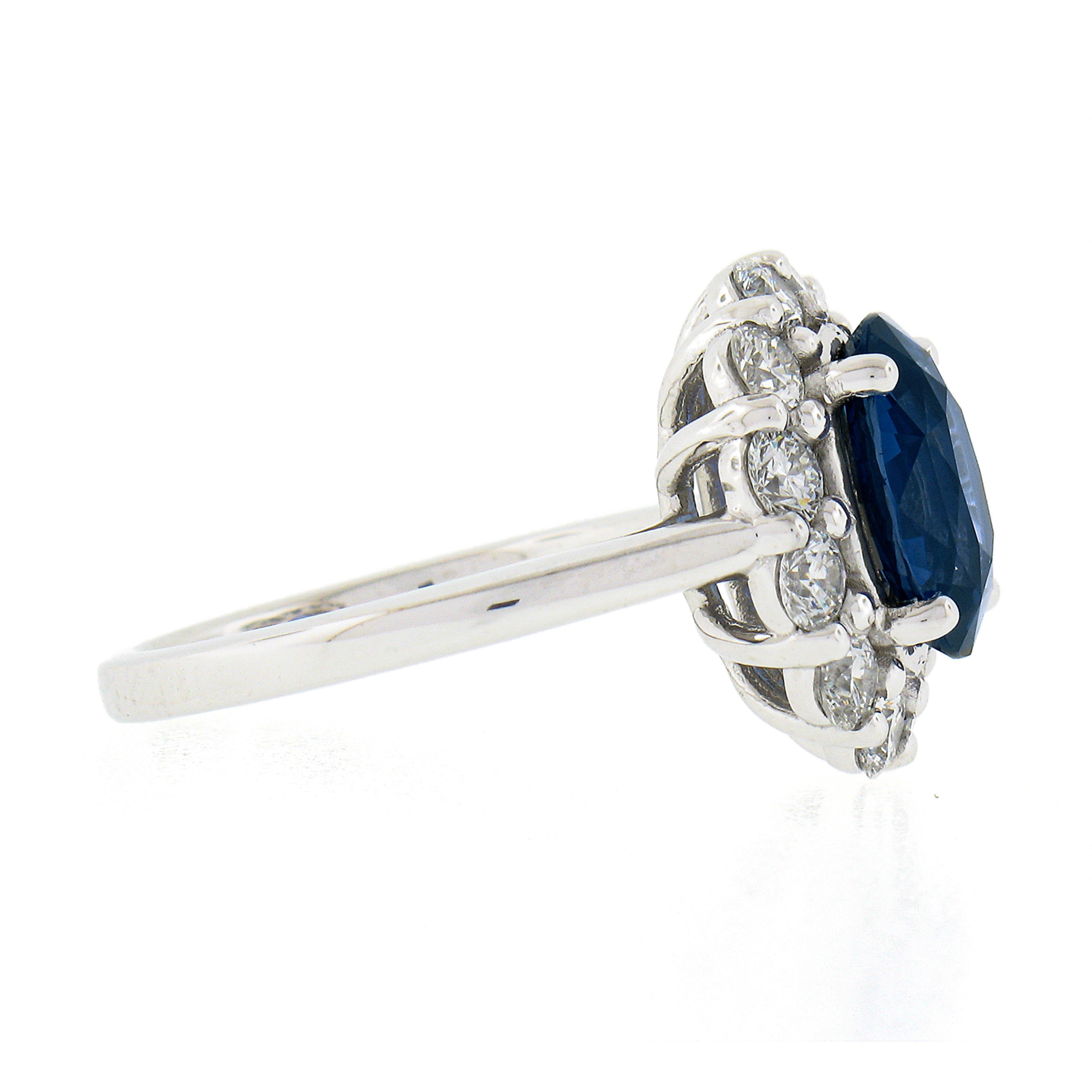 Women's New Platinum 4.79ctw GIA No Heat Oval Blue Sapphire & Diamond Halo Cocktail Ring For Sale