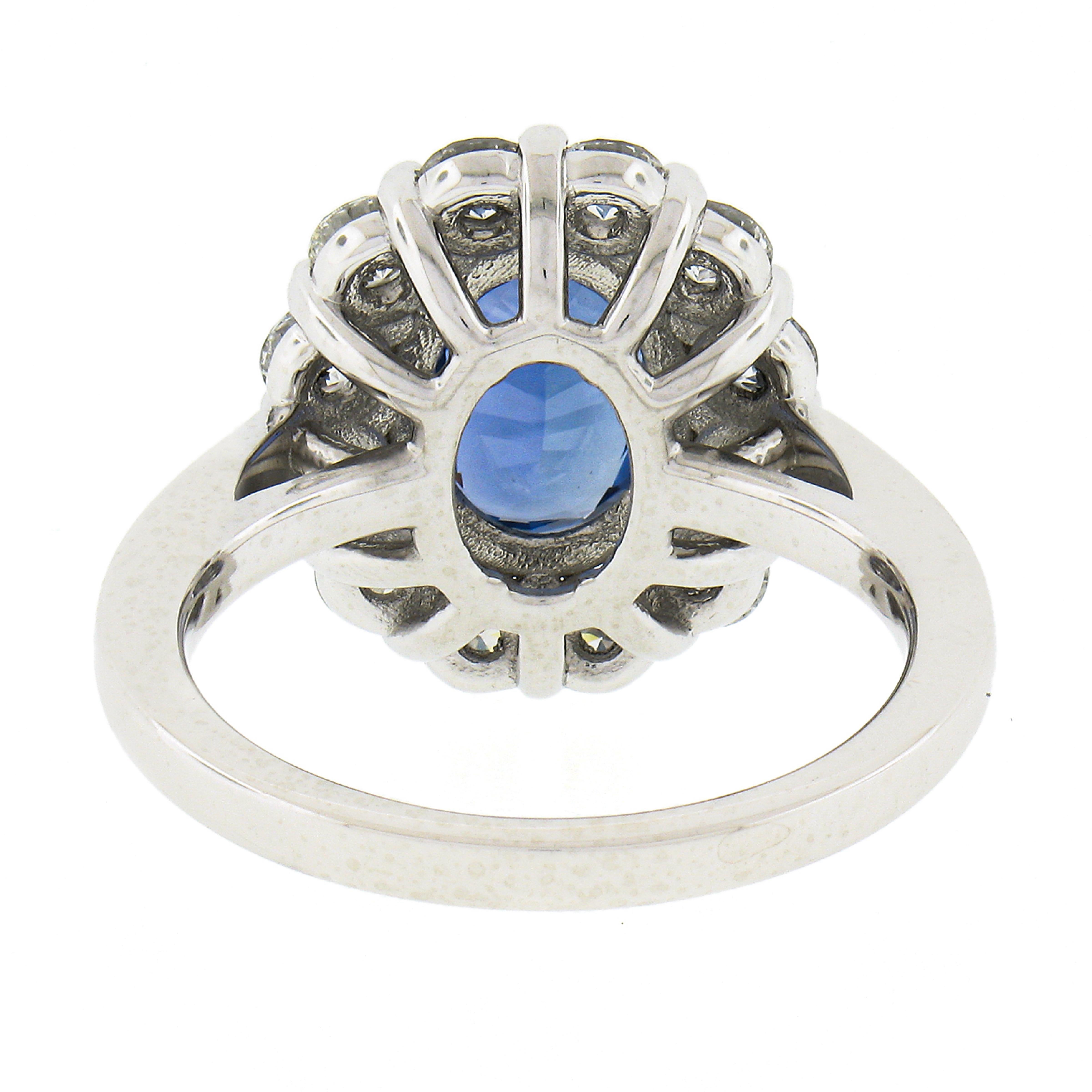 New Platinum 4.79ctw GIA No Heat Oval Blue Sapphire & Diamond Halo Cocktail Ring For Sale 2