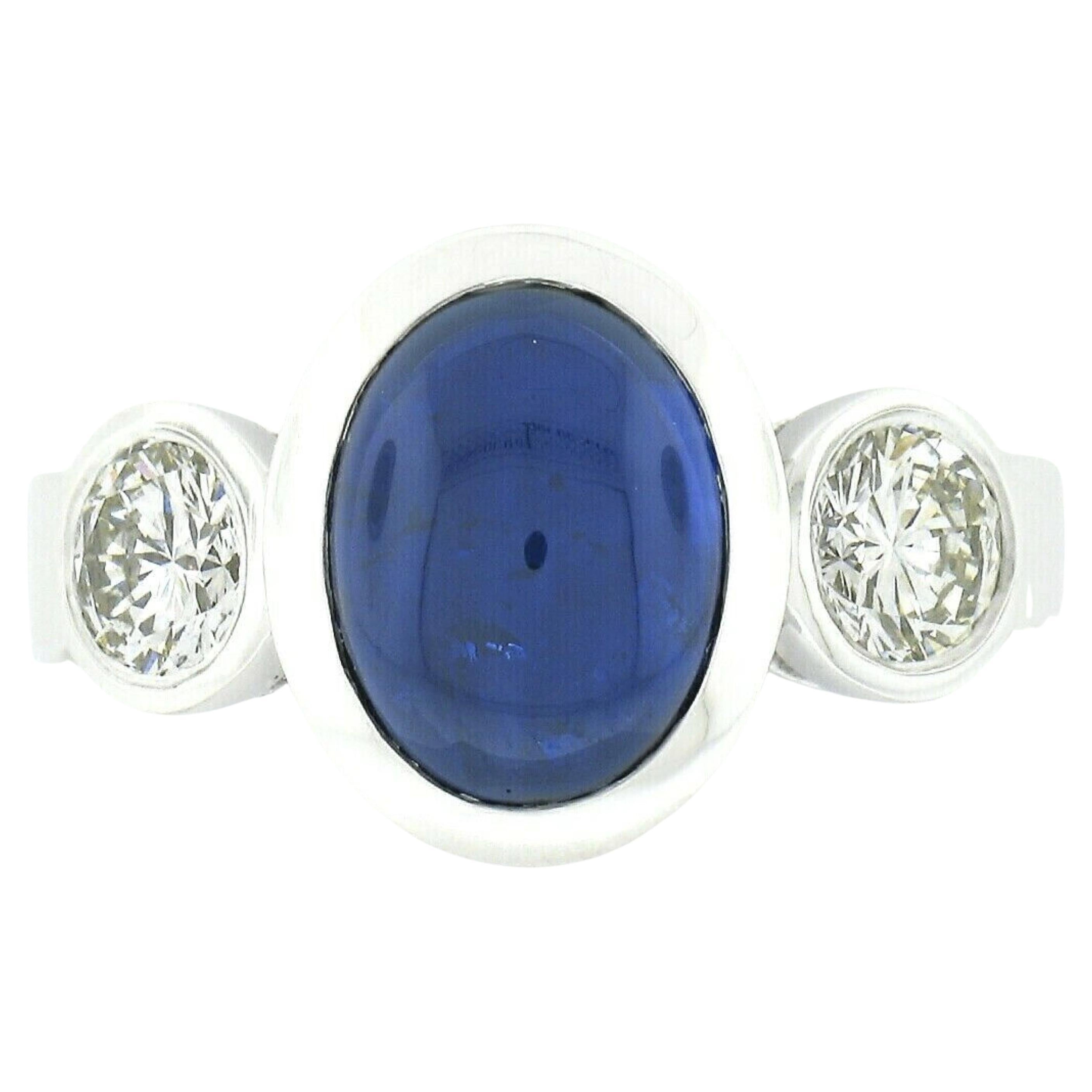 New Platinum 4.99ctw Gubelin Oval Cabochon Bezel Sapphire & Diamond 3 Stone Ring For Sale