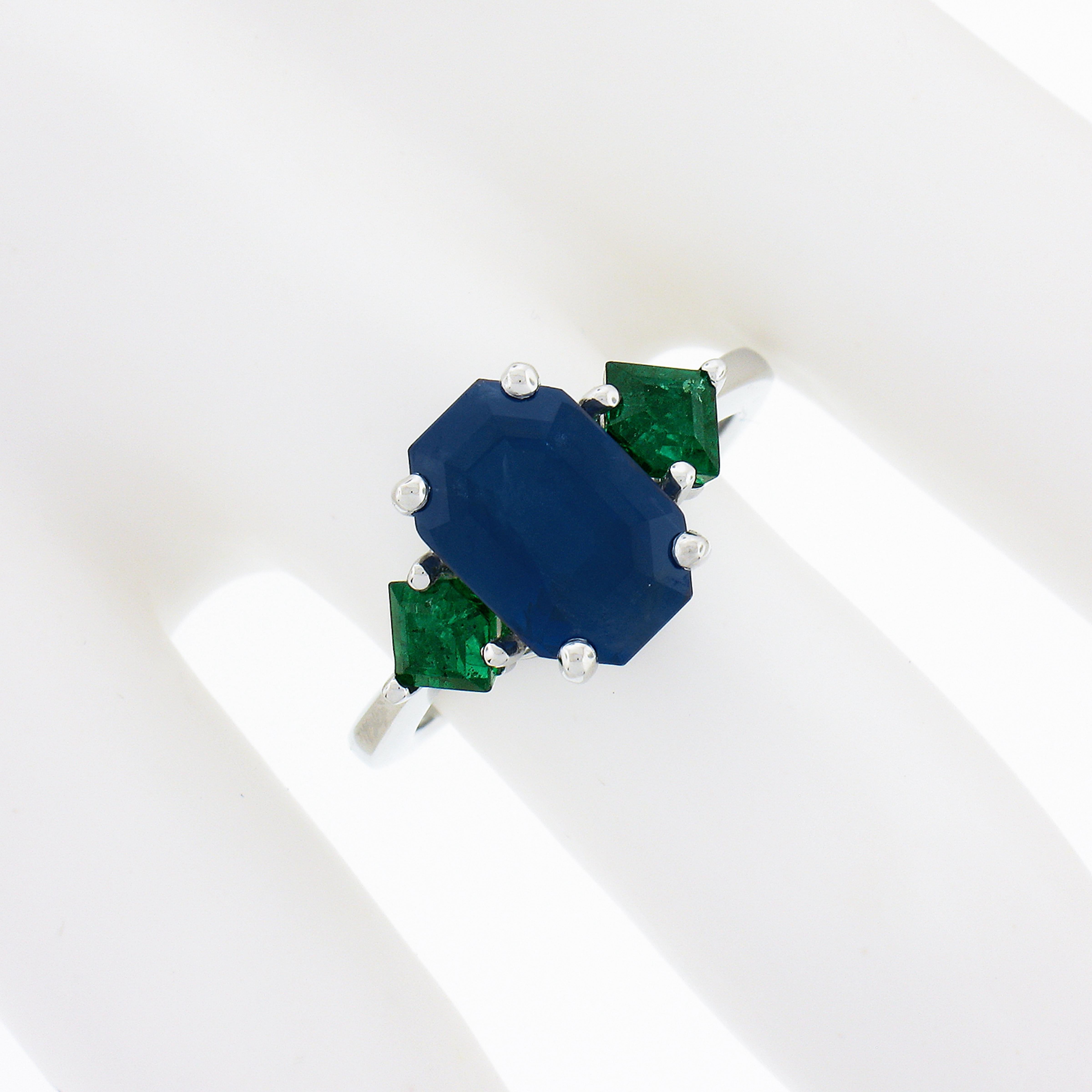 Women's New Platinum 5.32ctw Gubelin Emerald Cut Sapphire & Custom Cut Emerald Ring For Sale