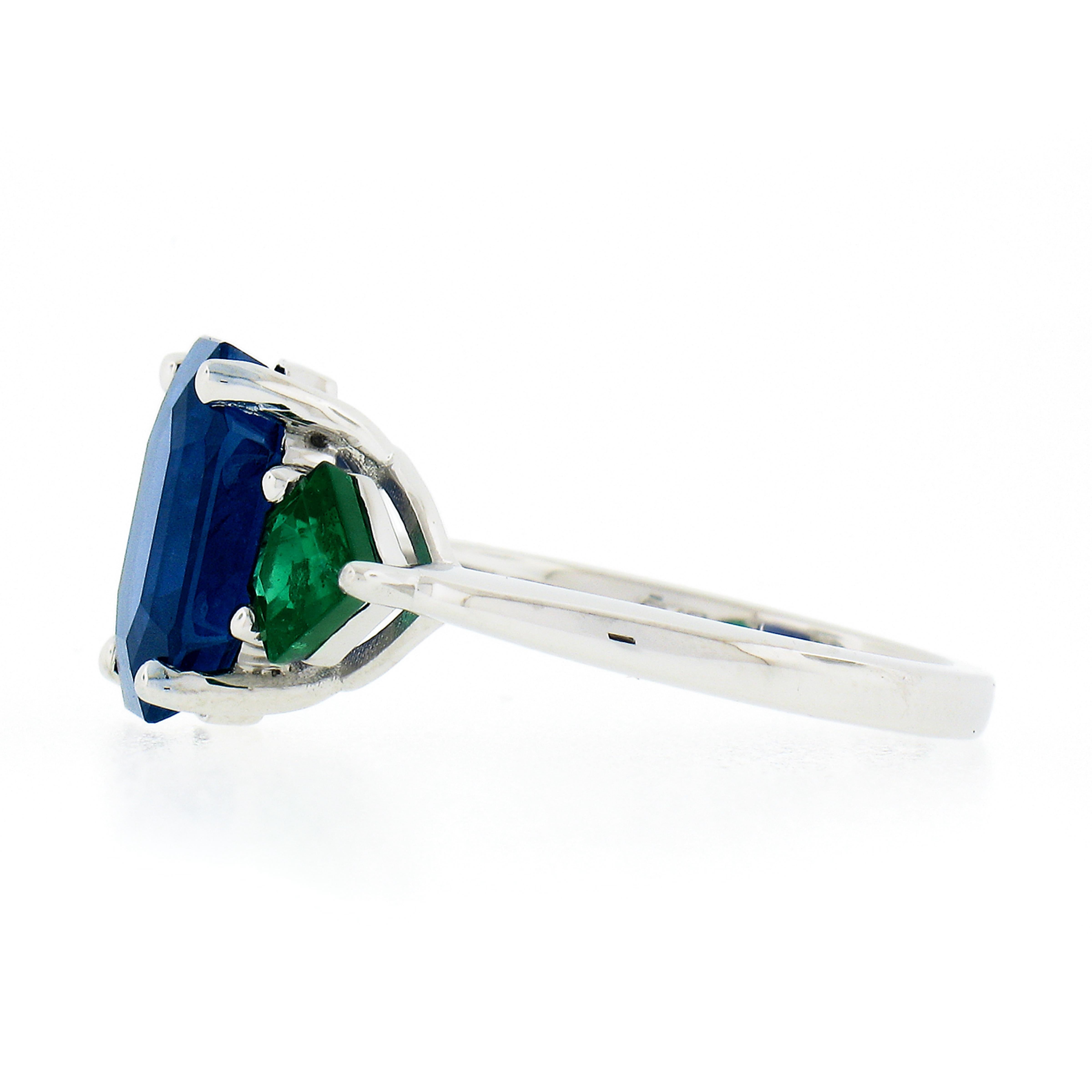 New Platinum 5.32ctw Gubelin Emerald Cut Sapphire & Custom Cut Emerald Ring For Sale 2
