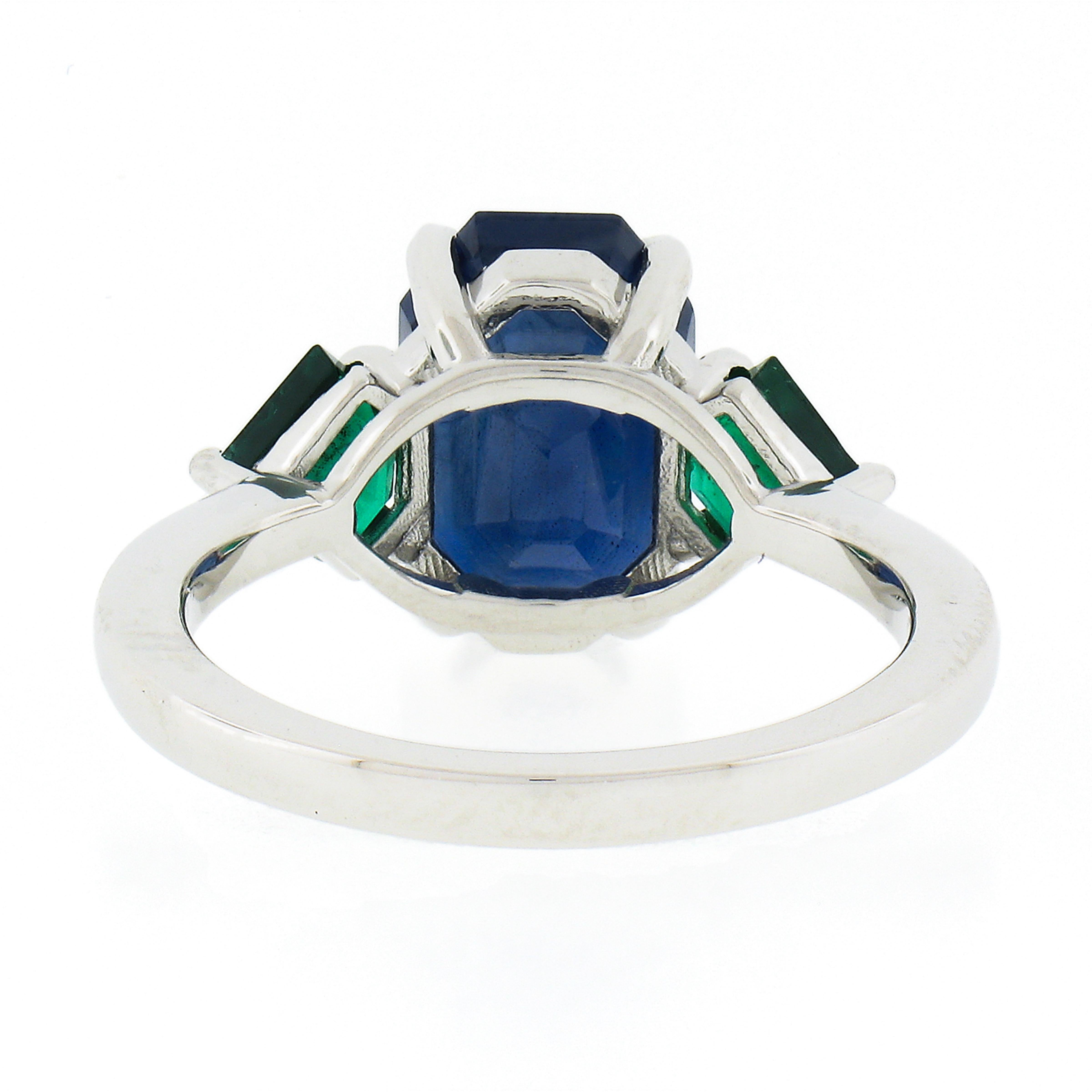 New Platinum 5.32ctw Gubelin Emerald Cut Sapphire & Custom Cut Emerald Ring For Sale 3