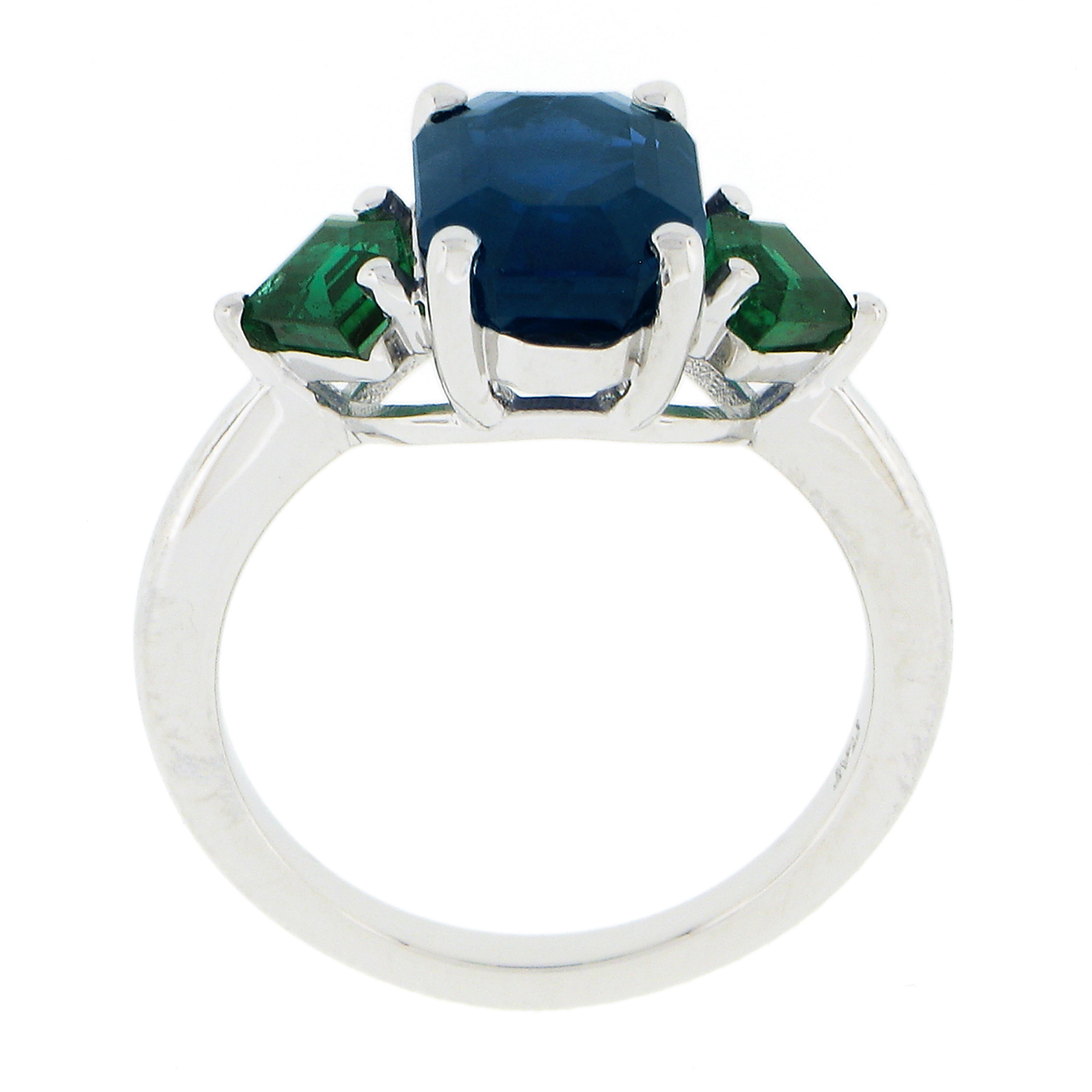 New Platinum 5.32ctw Gubelin Emerald Cut Sapphire & Custom Cut Emerald Ring For Sale 4