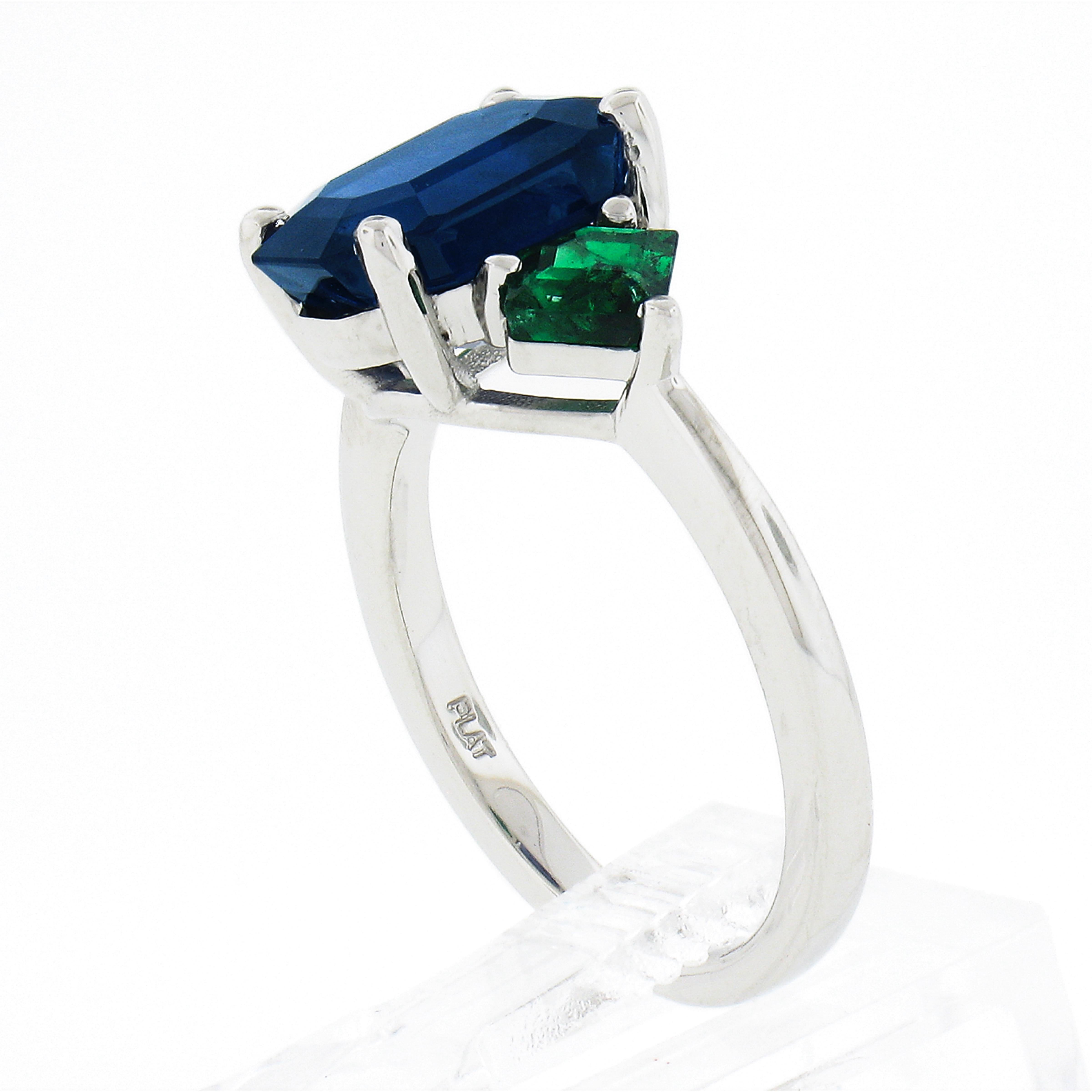 New Platinum 5.32ctw Gubelin Emerald Cut Sapphire & Custom Cut Emerald Ring For Sale 5