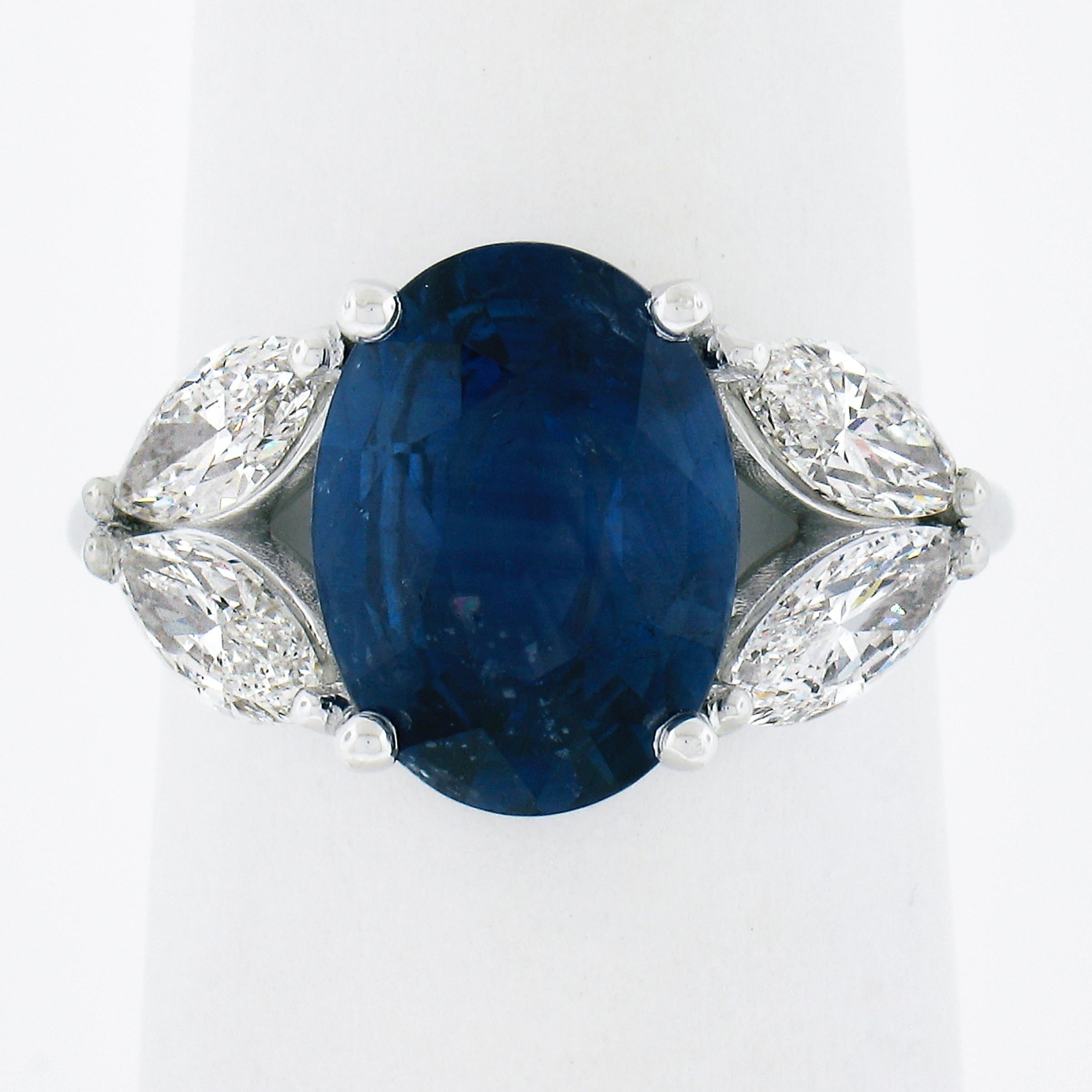 --Stone(s):--
(1) Natural Genuine Sapphire - Oval Brilliant Cut - Prong Set - Blue Color - Heated - 4.57ct (exact - certified)
**See Certification Details Below** 
(4) Natural Genuine Diamonds - Marquise Cut - Prong Set - G/H Color - VS2/SI1 Clarity