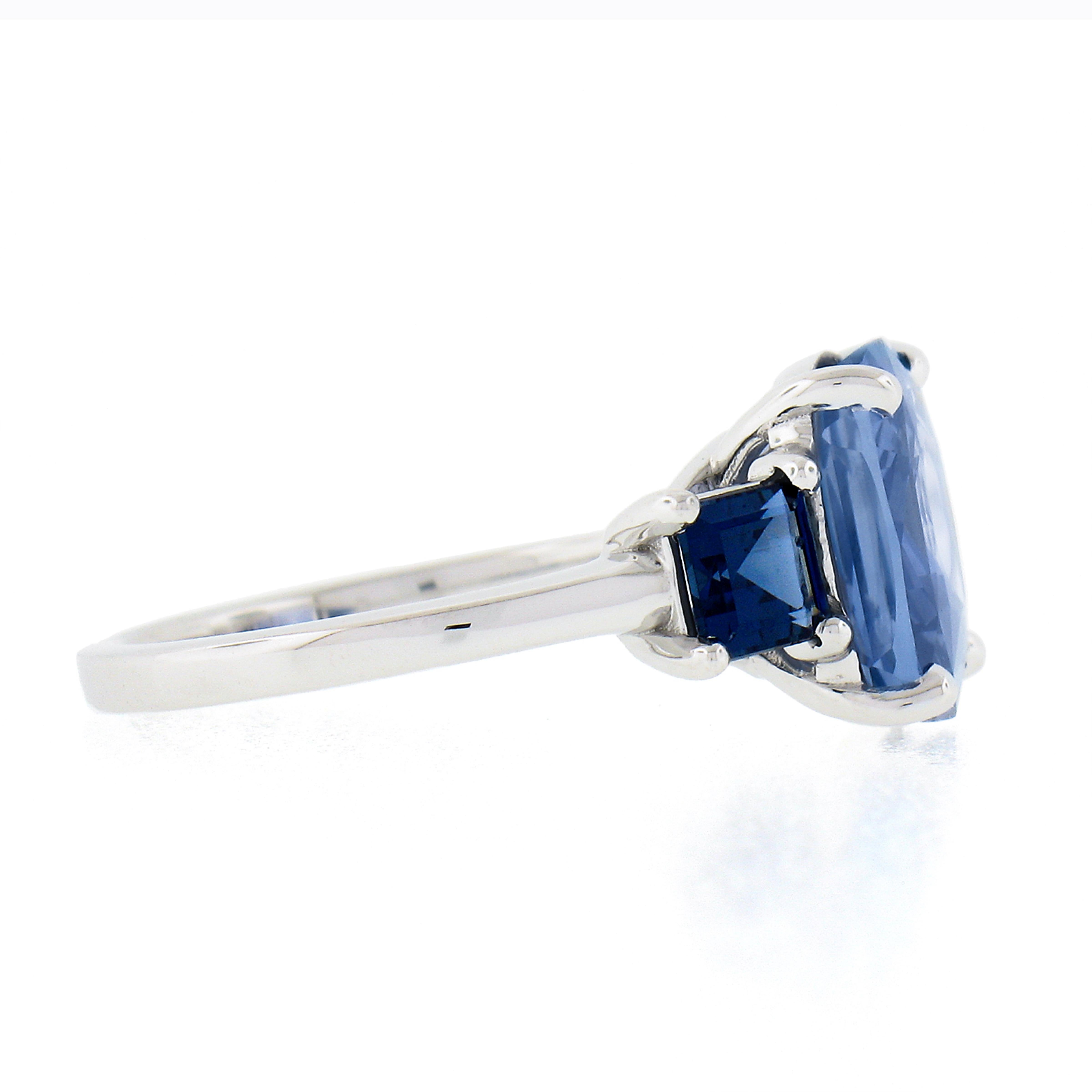 New Platinum 6.12 Ctw GIA Cushion Ceylon Light & Dark Blue Sapphire 3 Stone Ring In New Condition In Montclair, NJ