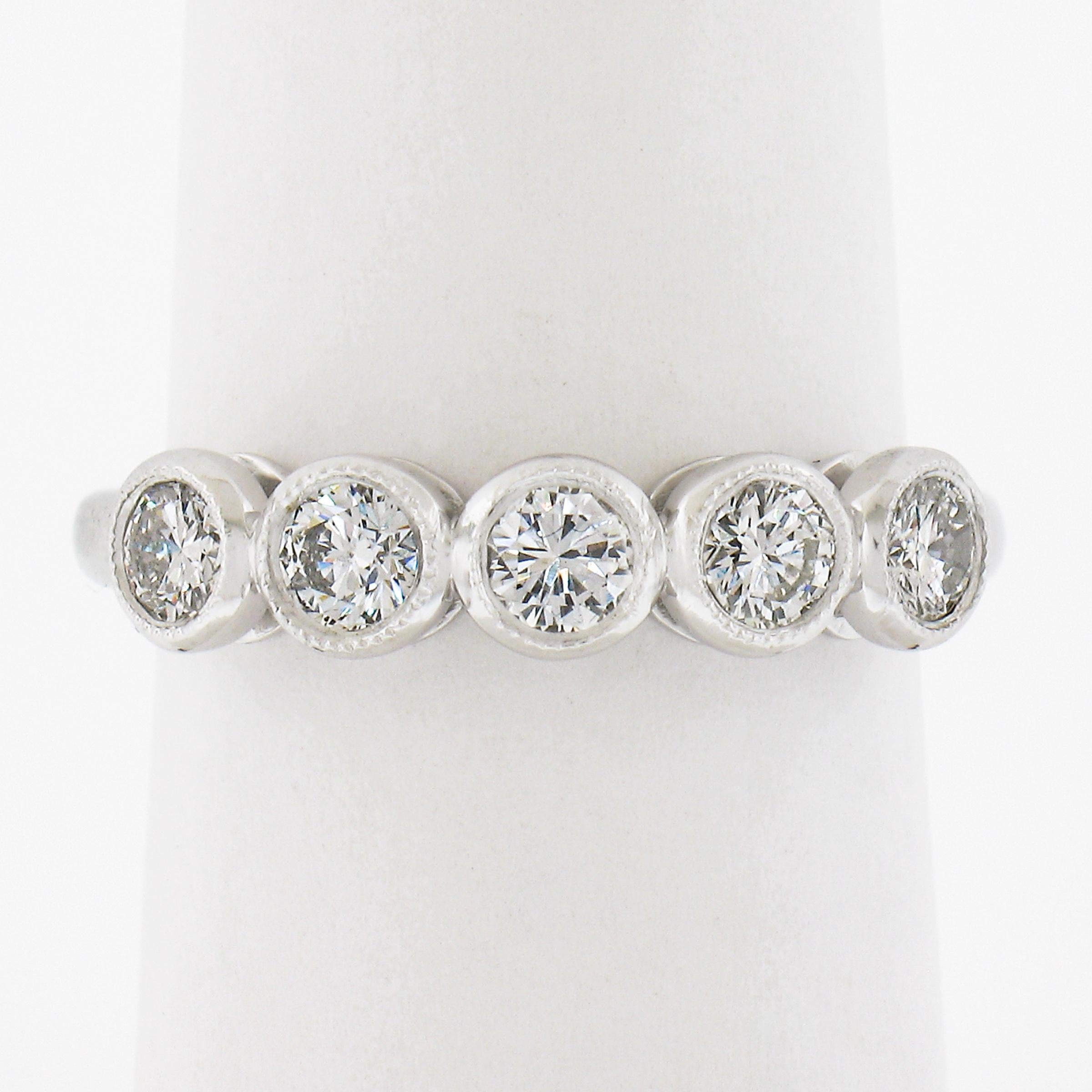 --Stone(s):--
(5) Natural Genuine Diamonds - Round Brilliant Cut - Milgrain Bezel Set - G/H Color - VS2-SI2 Clarity 
Total Carat Weight:	0.68 (exact)

Material: Solid Platinum Gold
Weight: 5.10 Grams
Ring Size: 6.5 (Fitted on a finger. We can custom